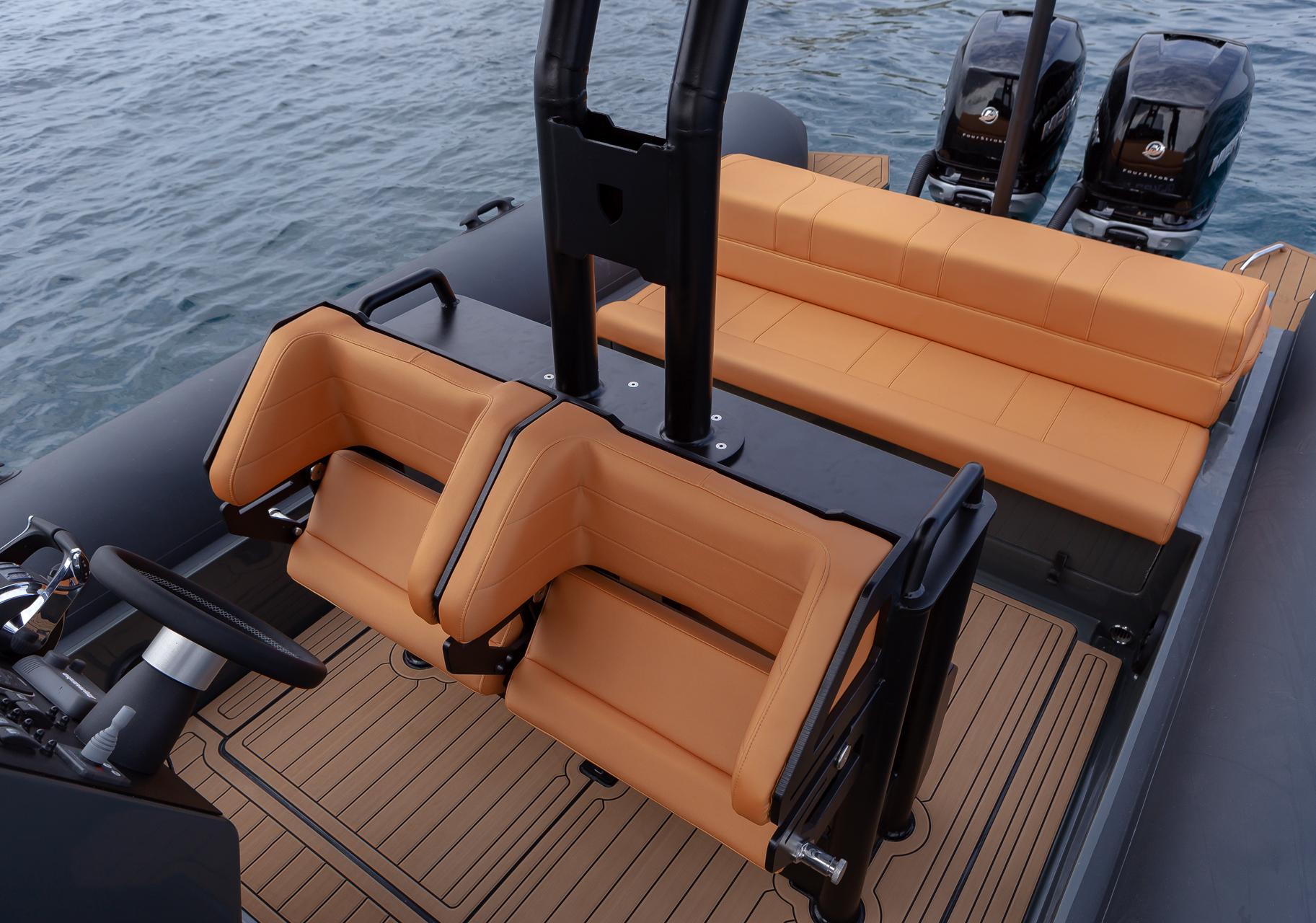 2024 Onda 341 Patrol boat interior with tan seating and dual engines.