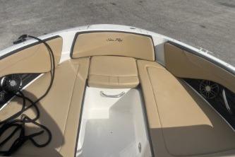2017 Sea Ray SPX 210 Outboard boat interior with tan seating and black accents.
