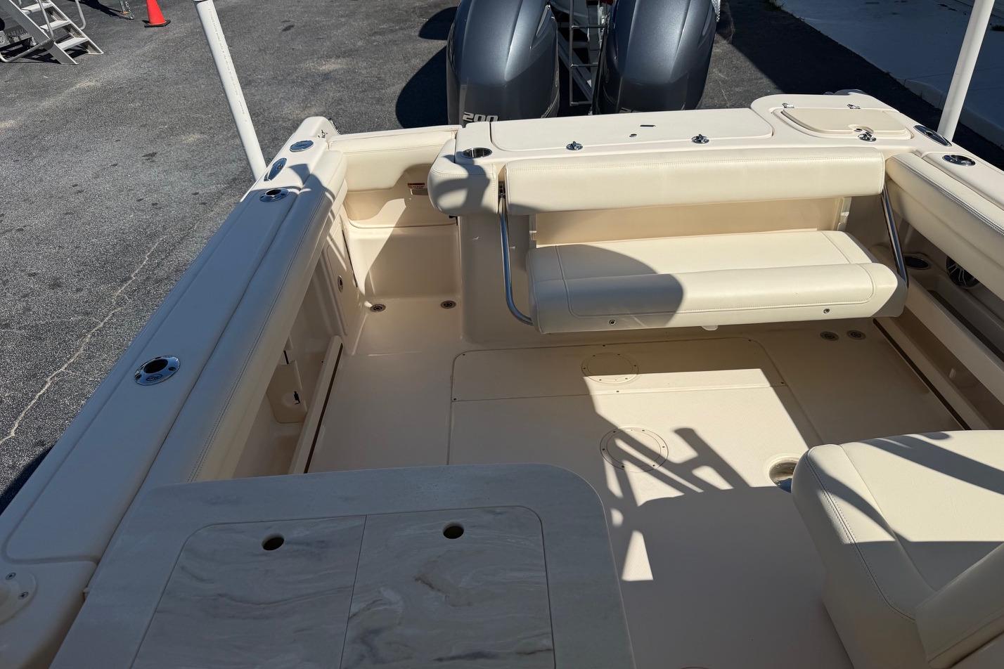 2022 Grady-White Freedom 275 boat interior with seating and storage compartments.
