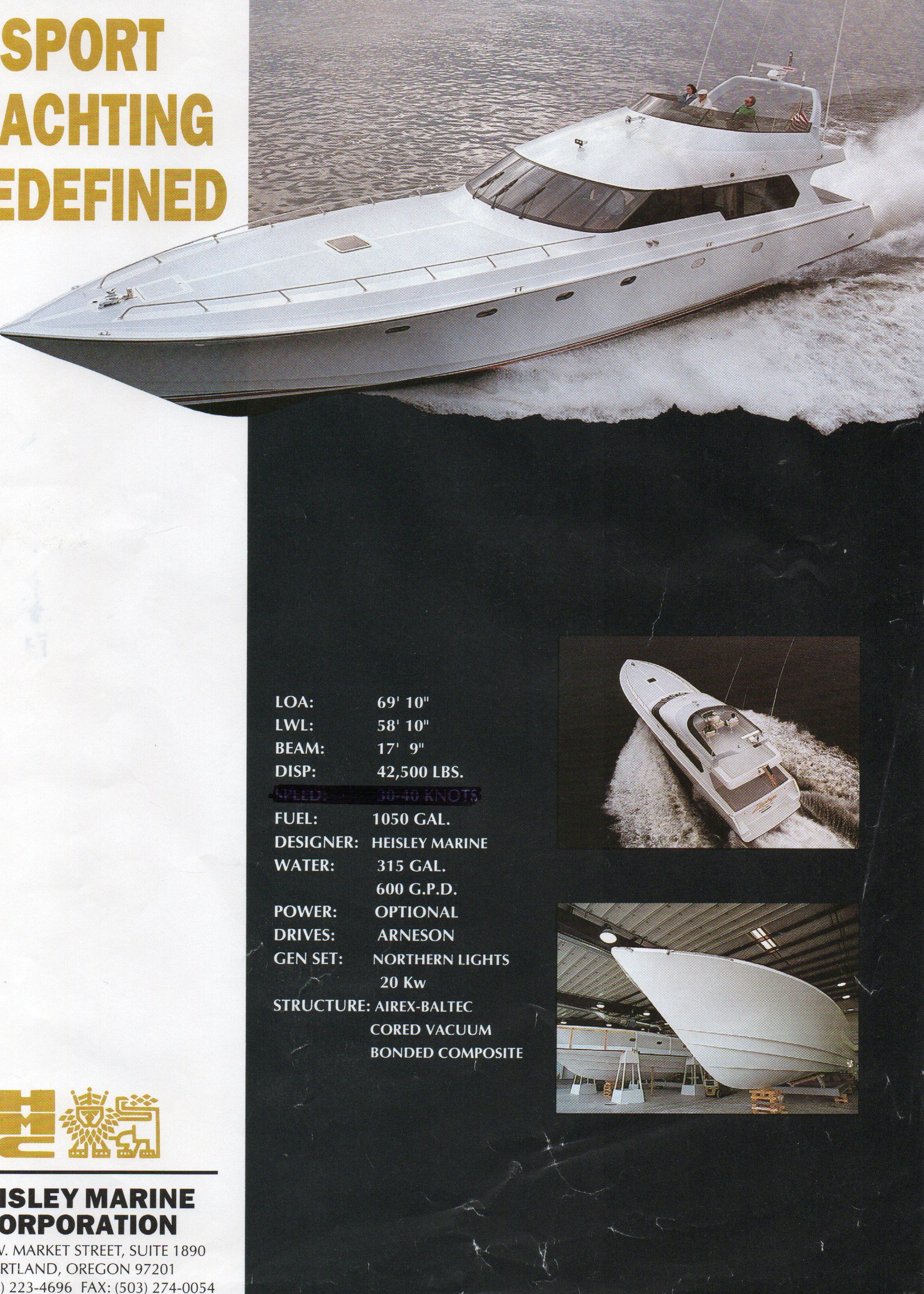 Luxury motor yacht on water, sleek design, built in 1990.