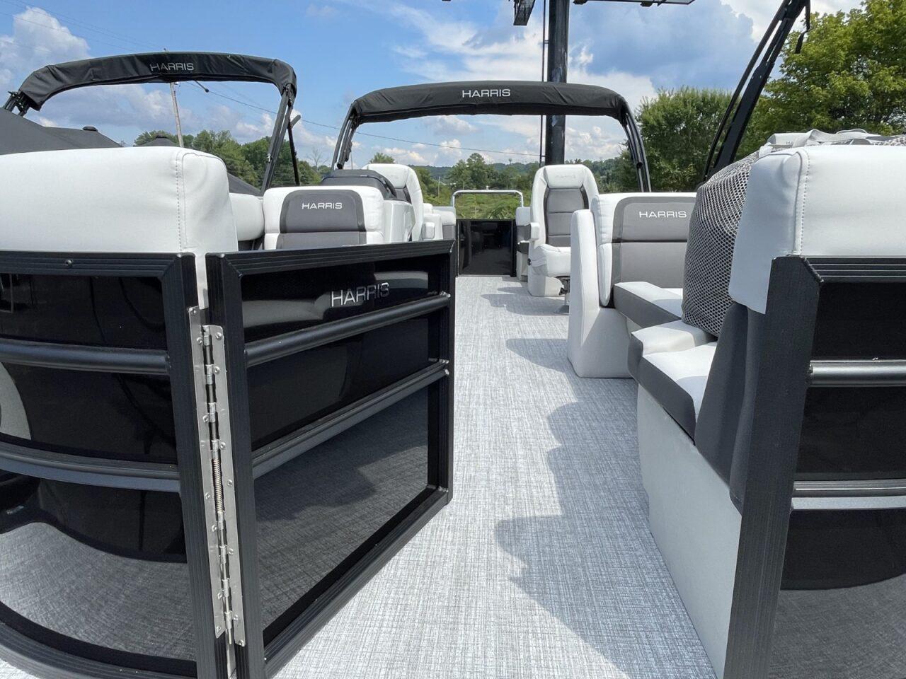 2026 Harris Cruiser 230 pontoon boat interior with modern seating and sleek design.