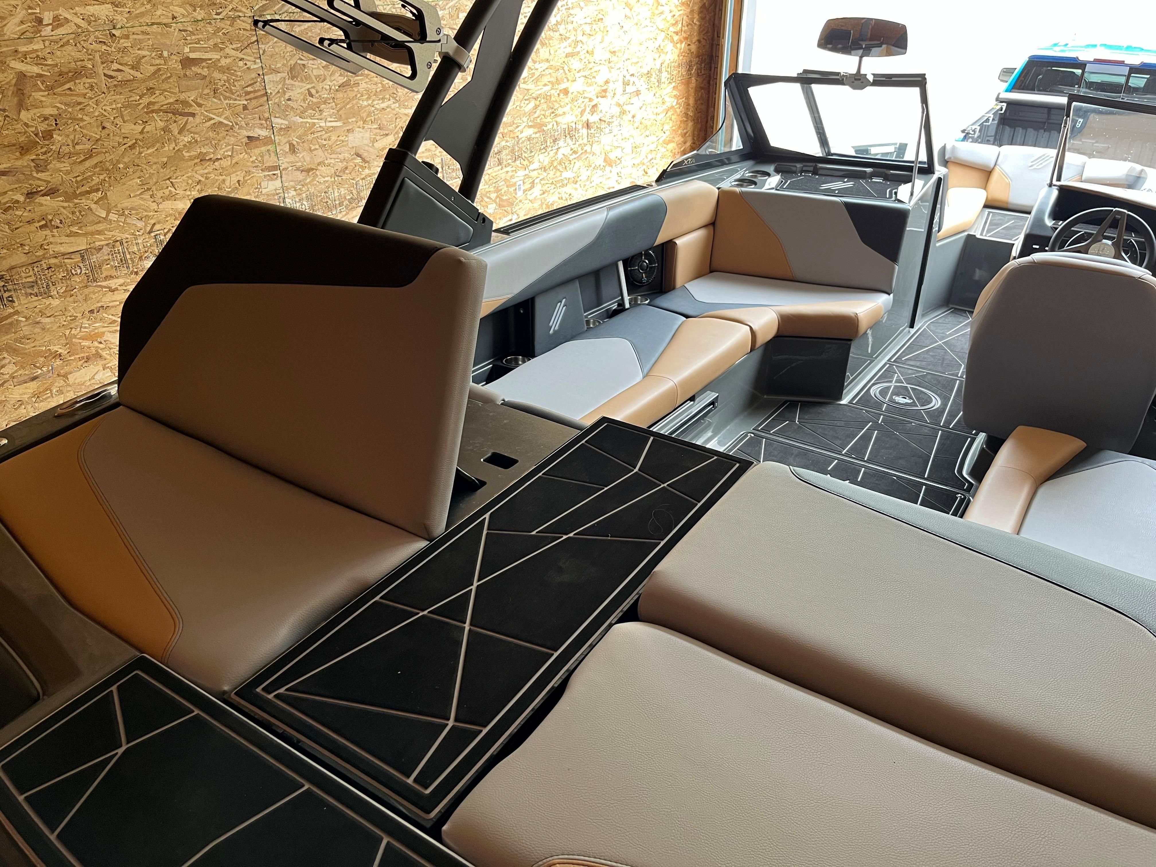 Interior of a 2022 ATX Surf Boats 22 Type-S with modern seating and stylish design.
