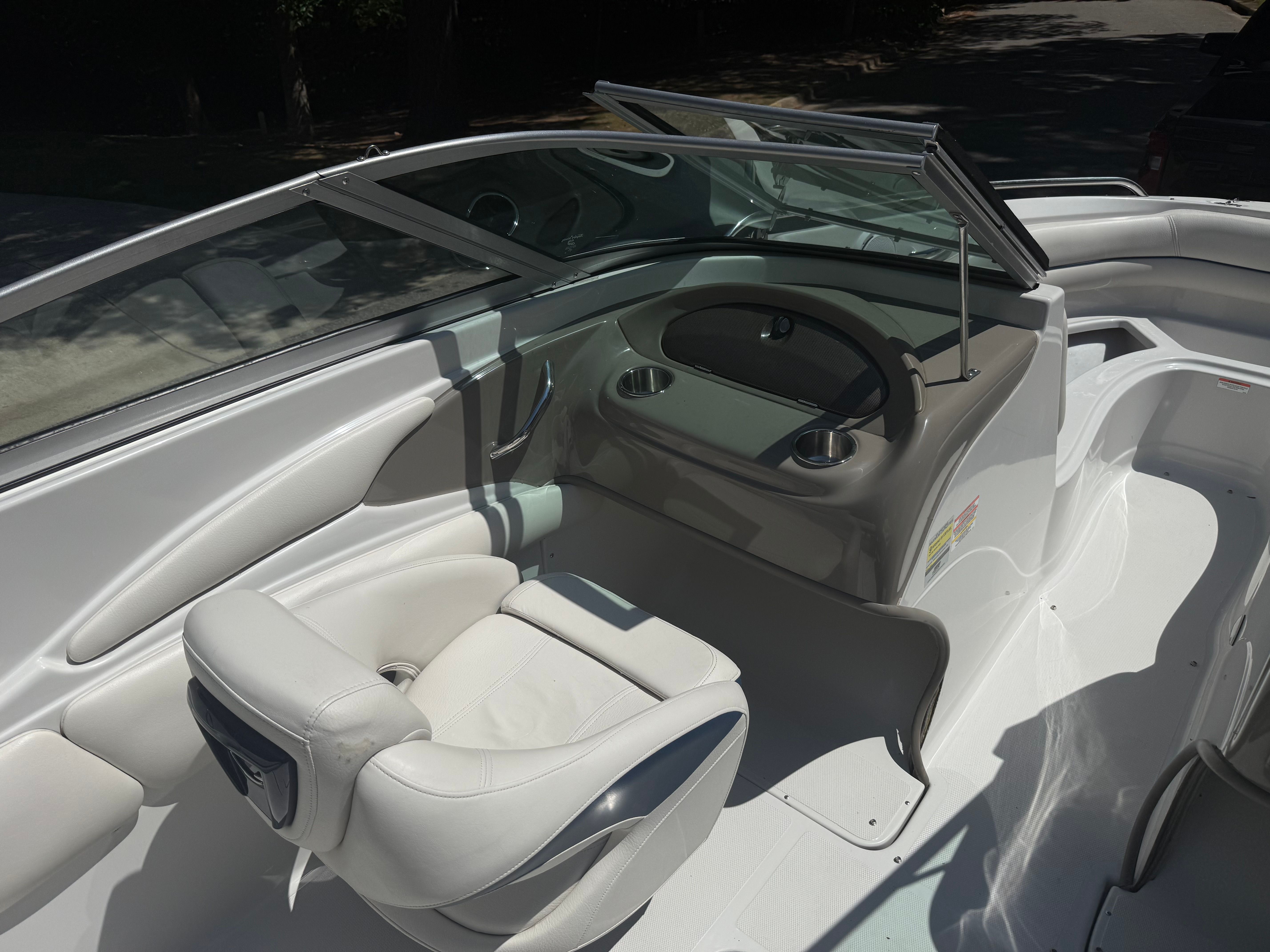 Interior of a 2008 Crownline 210 LX boat with white seating.