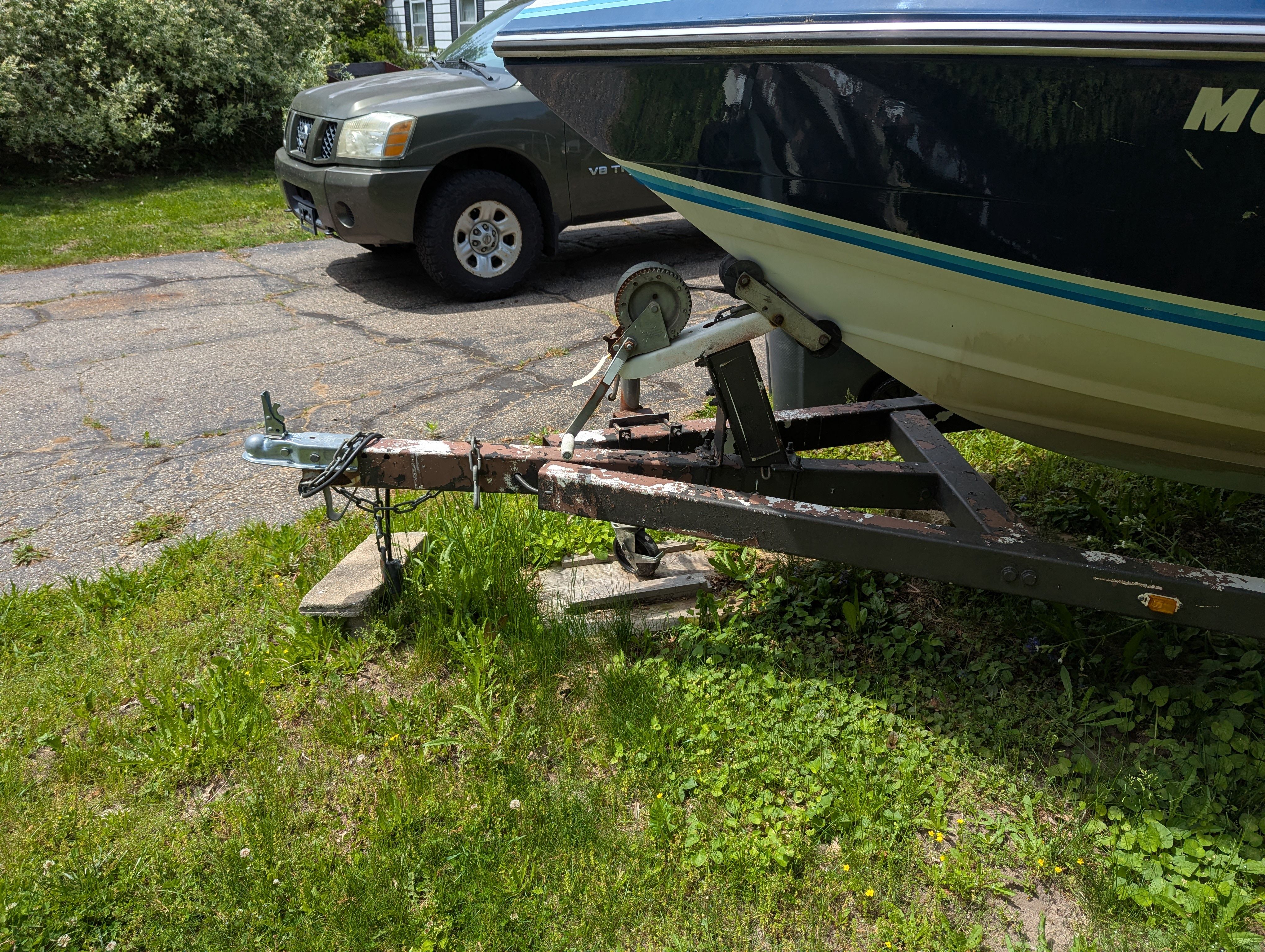1988 Four Winns 200 Horizon boat on trailer outdoors.