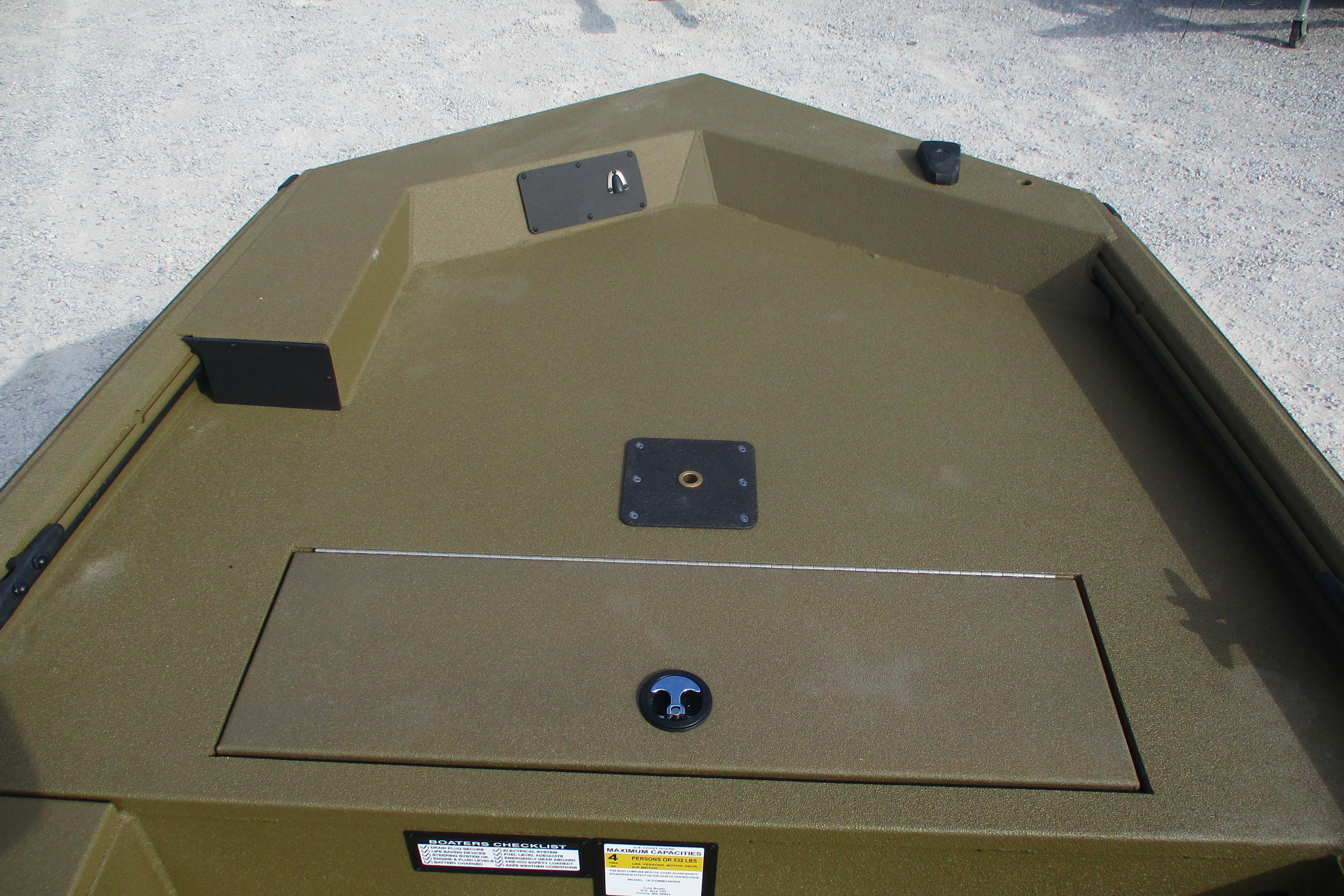 2026 Avid 16 Commander boat deck with storage compartments and mounting points.