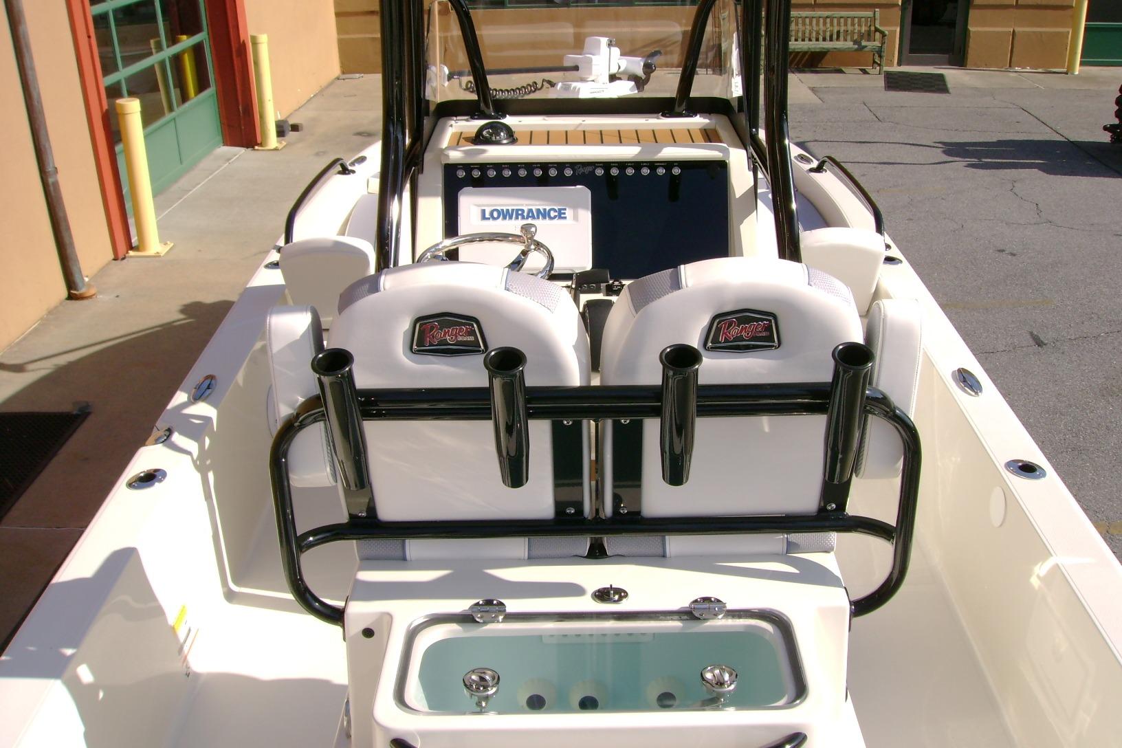 2026 Ranger 2360 Bay boat interior with seating and fishing rod holders.