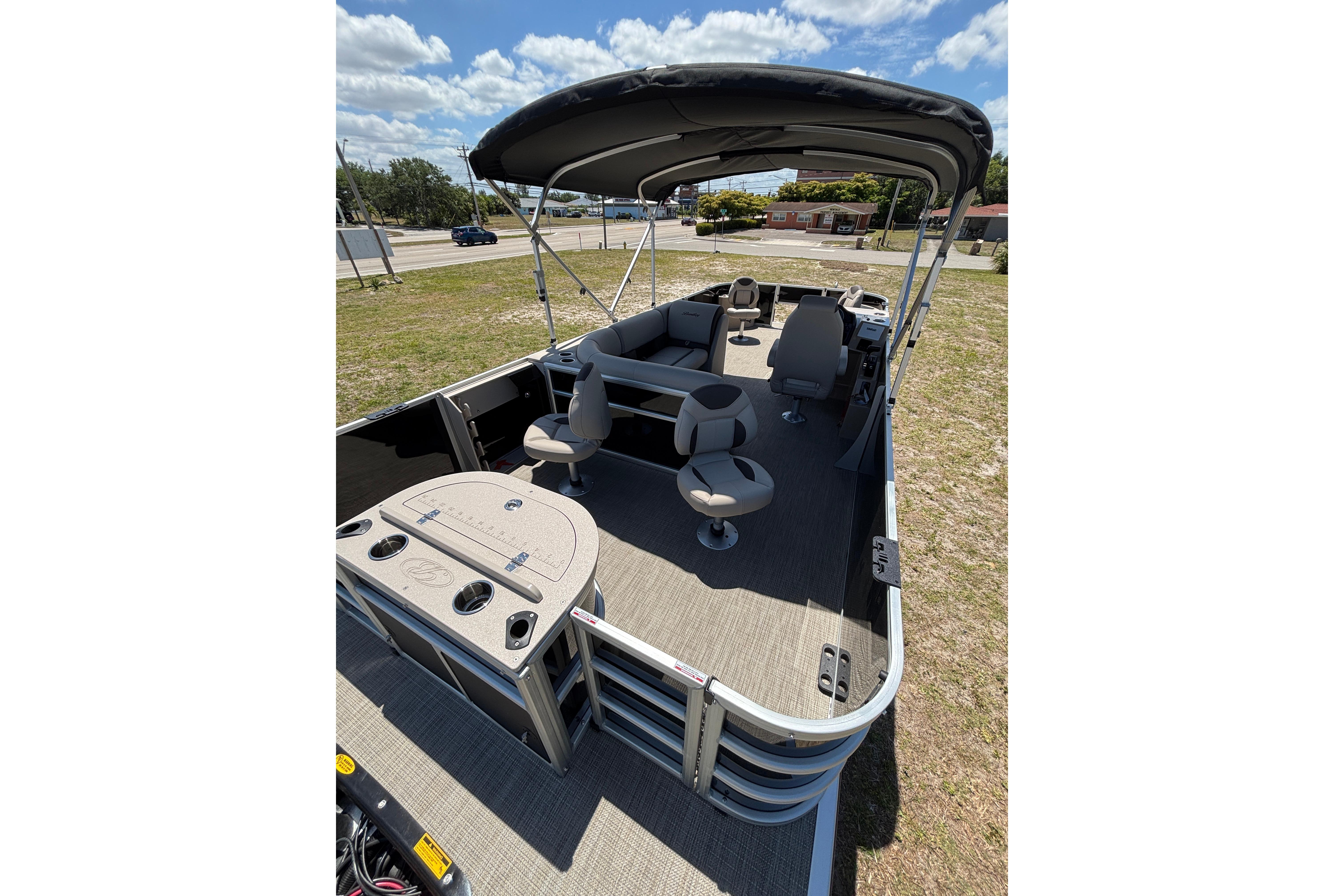2026 Bentley Pontoons Fish 243 4-Point with spacious deck and seating.