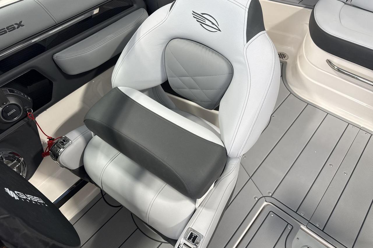 The interior of a 2026 Chaparral SSX 4 featuring a sleek white seat.