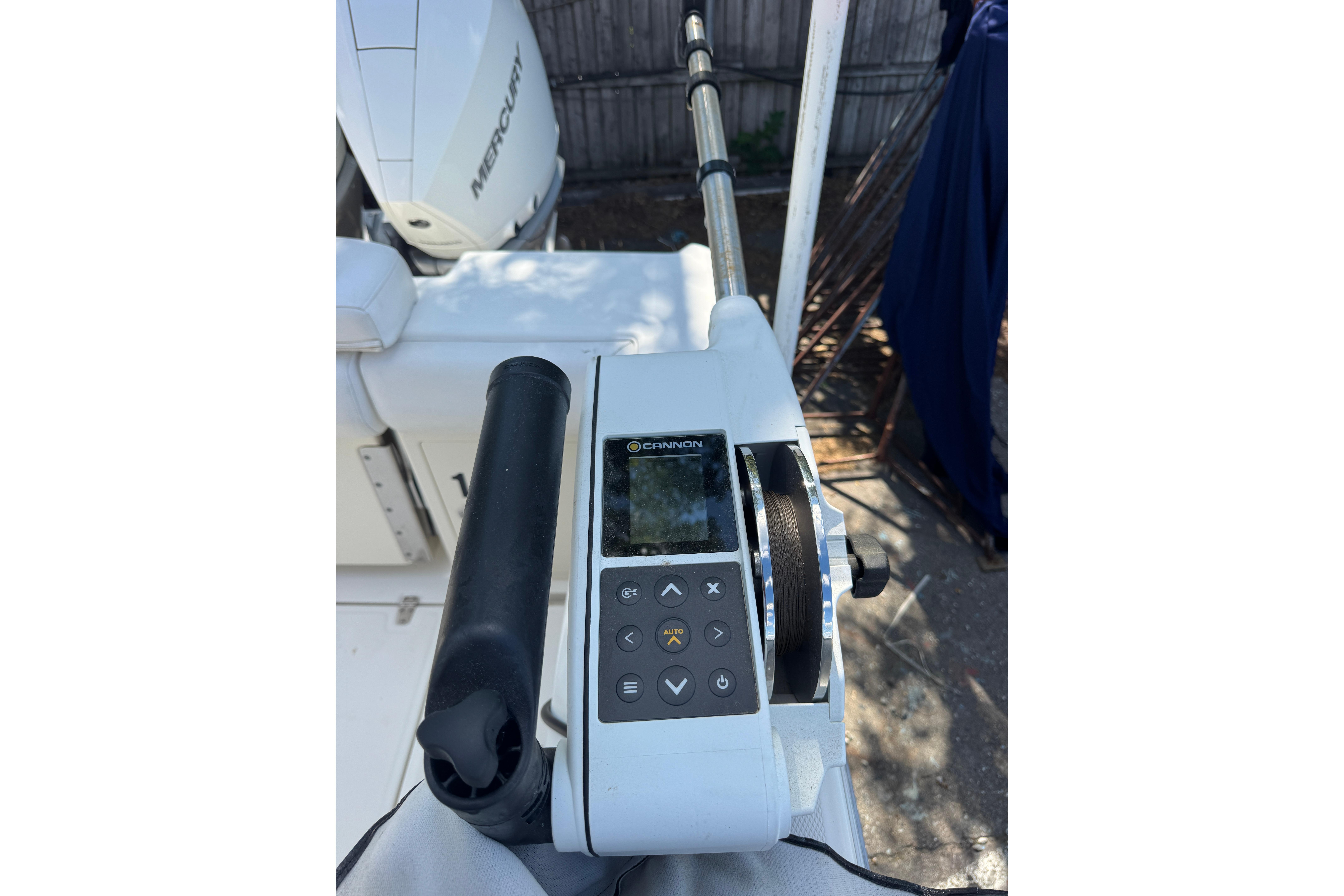 Control panel of a 2014 Boston Whaler 250 Outrage boat with Mercury engine.