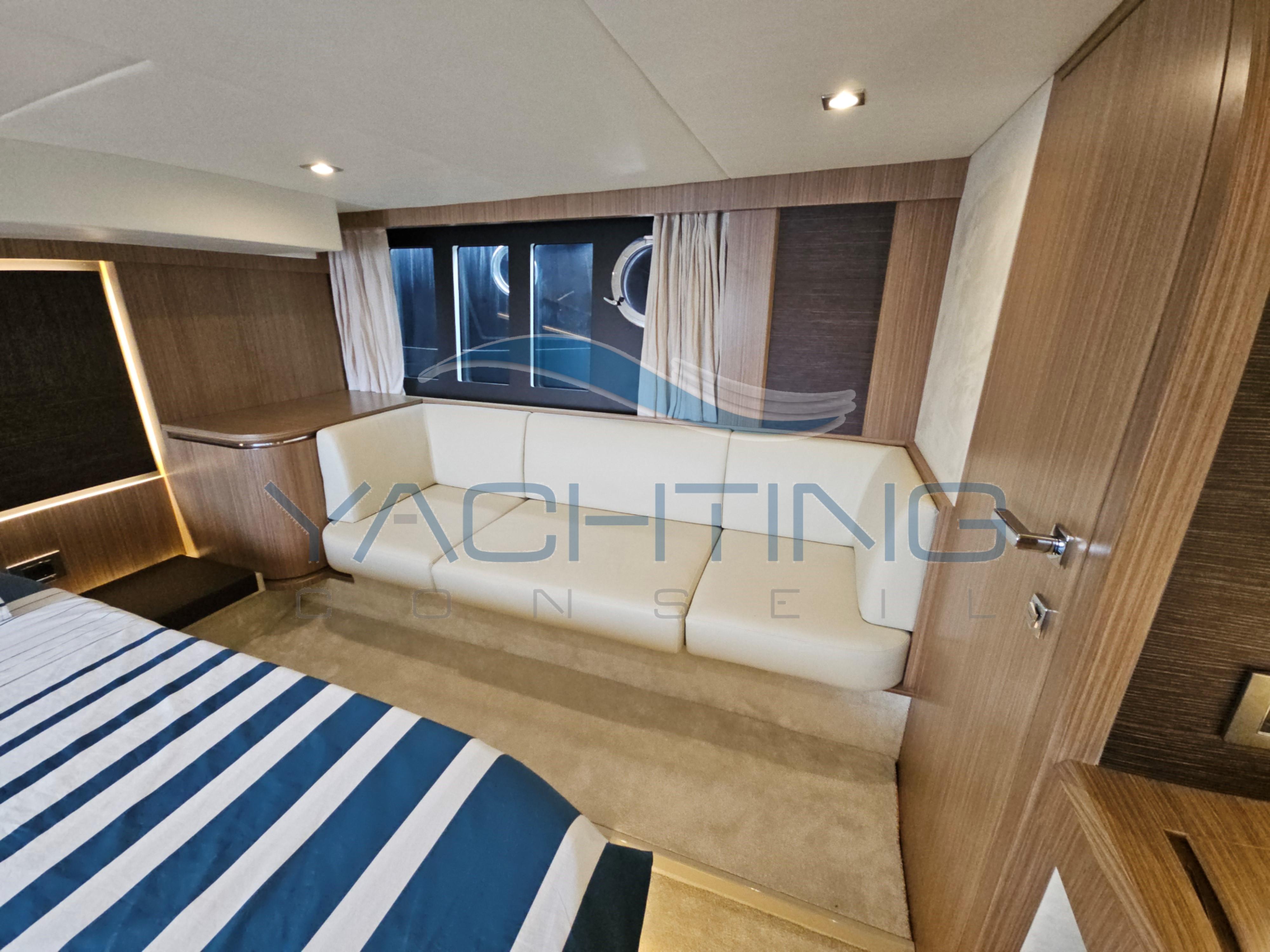 Luxurious interior of 2018 Absolute 45 FLY yacht with modern wood and fabric design.