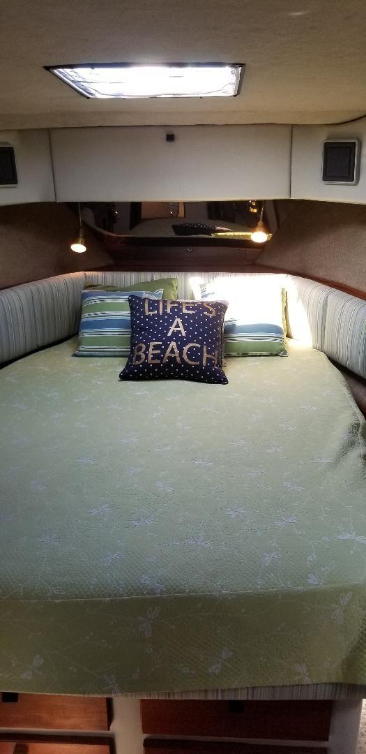 Interior of 1989 Bayliner 3888 Motoryacht with cozy bed.