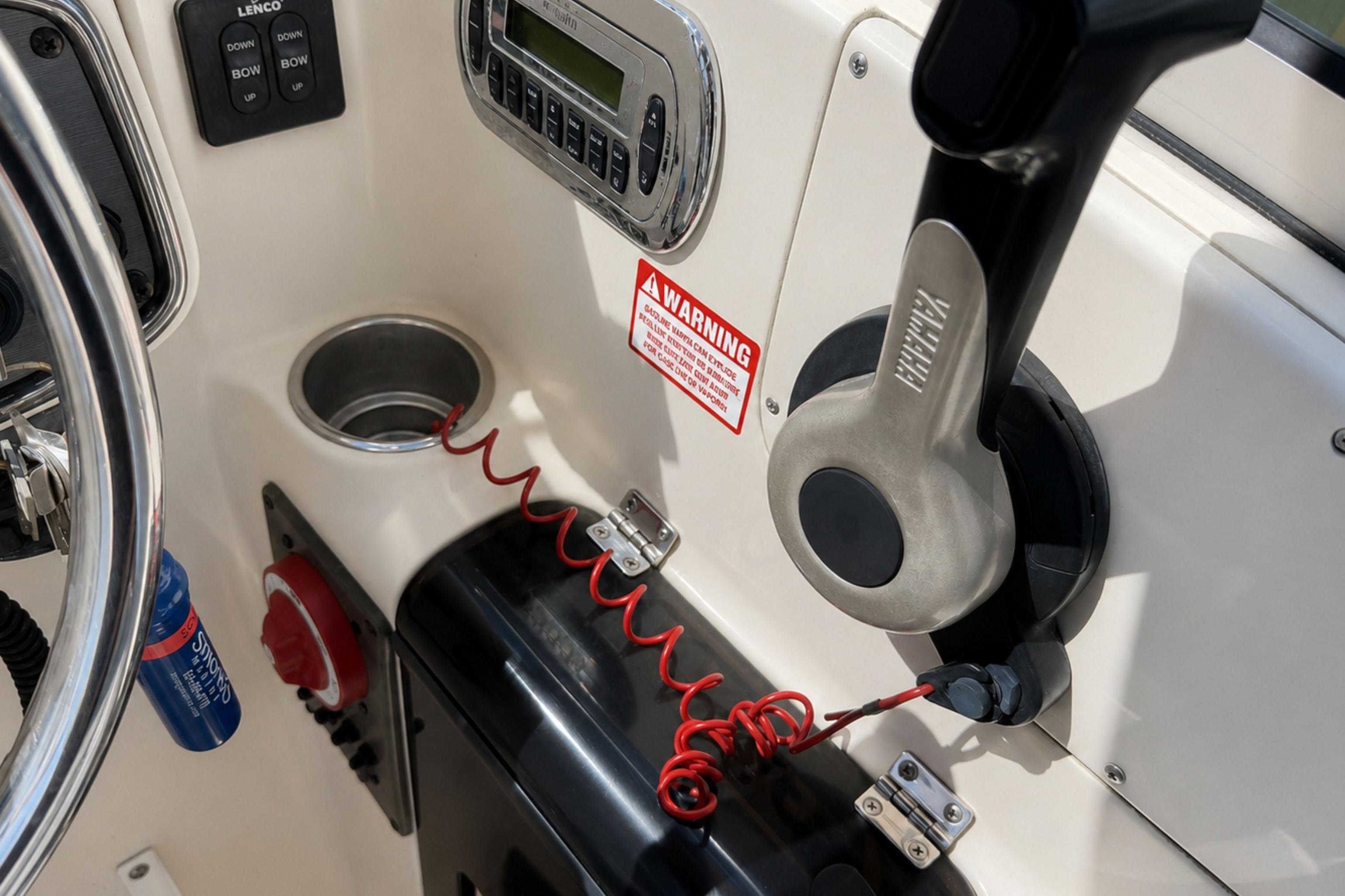 Close-up of 2008 Scout 222 Abaco boat controls, featuring steering wheel and throttle lever.
