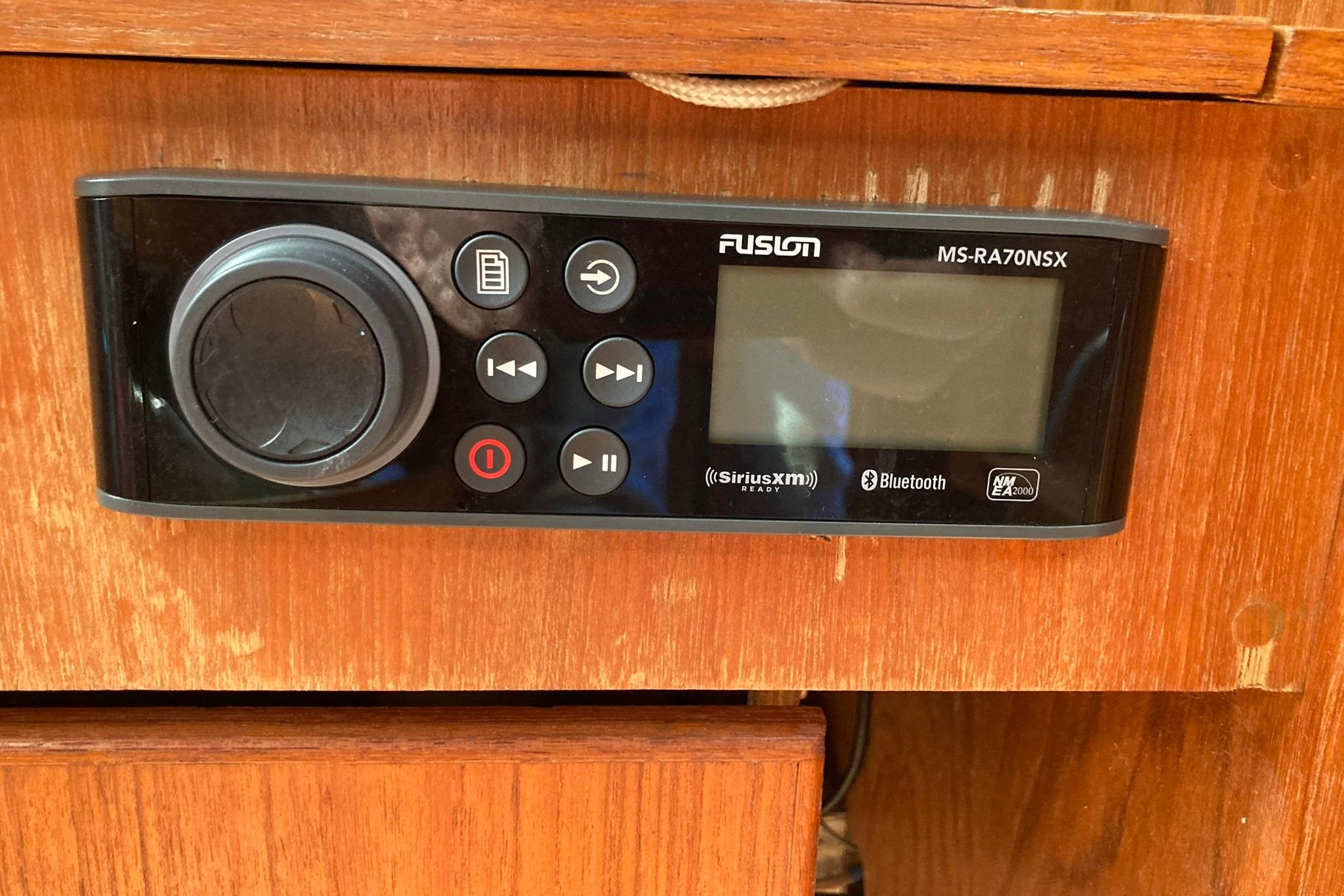 Fusion MS-RA70NSX stereo system on 1987 Hunter Legend 35 boat interior.