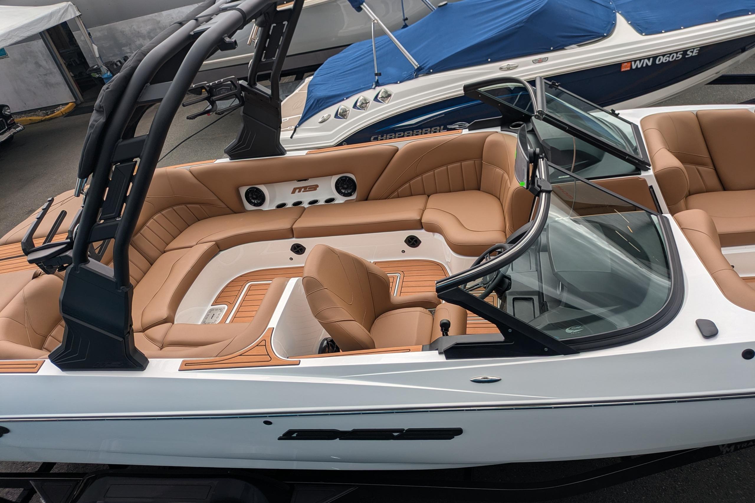 2026 MB B52-23 Classic LIMITED boat with luxurious tan interior and sleek design.