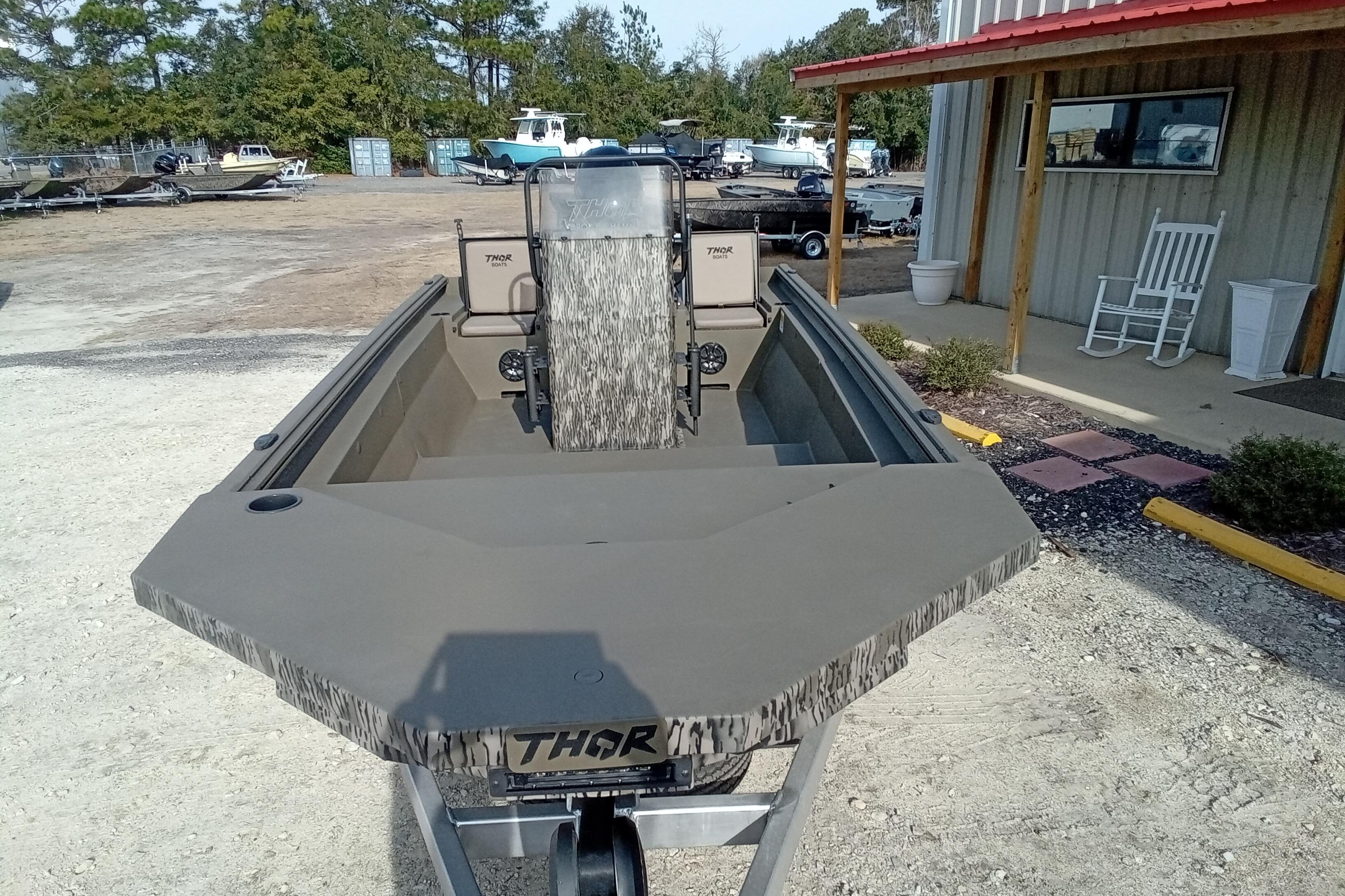 2026 Thor 1900 Low Country Elite boat on display at a dealership.
