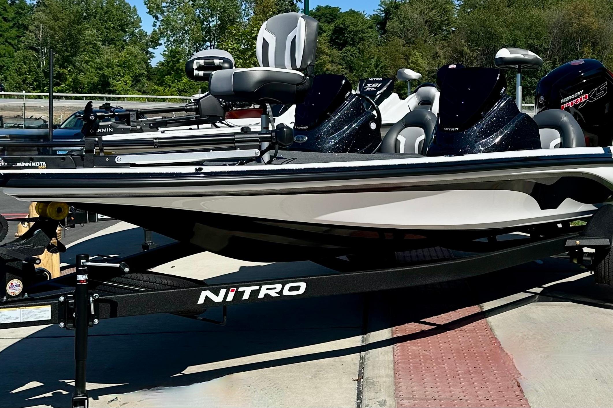 2026 Nitro Z17 boat on trailer, parked outdoors, featuring sleek design and modern equipment.