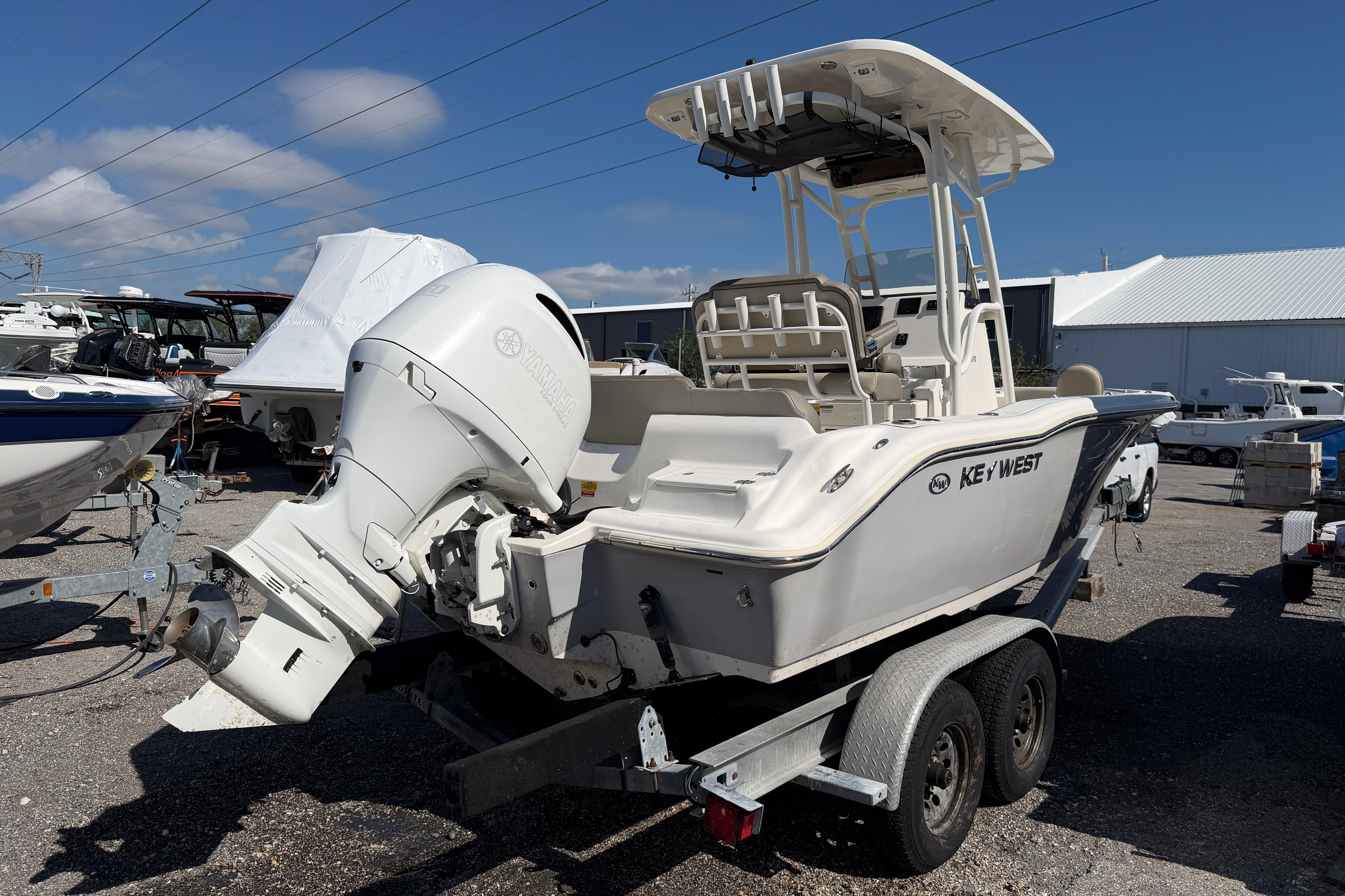2022 Key West 219 FS boat on trailer, featuring Yamaha outboard motor.