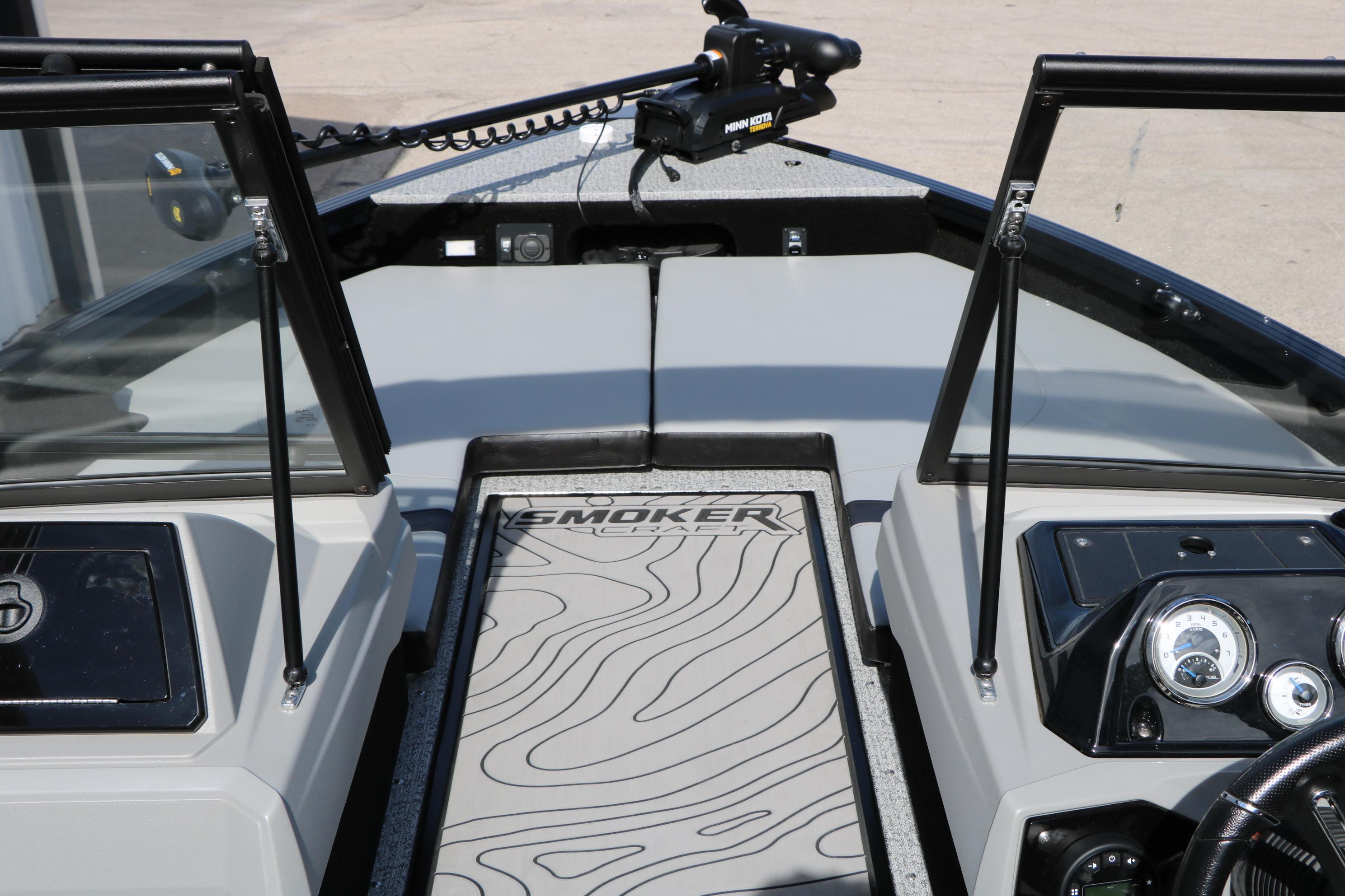 2025 Smoker Craft Adventurer 188 DC boat dashboard with modern controls and sleek design.