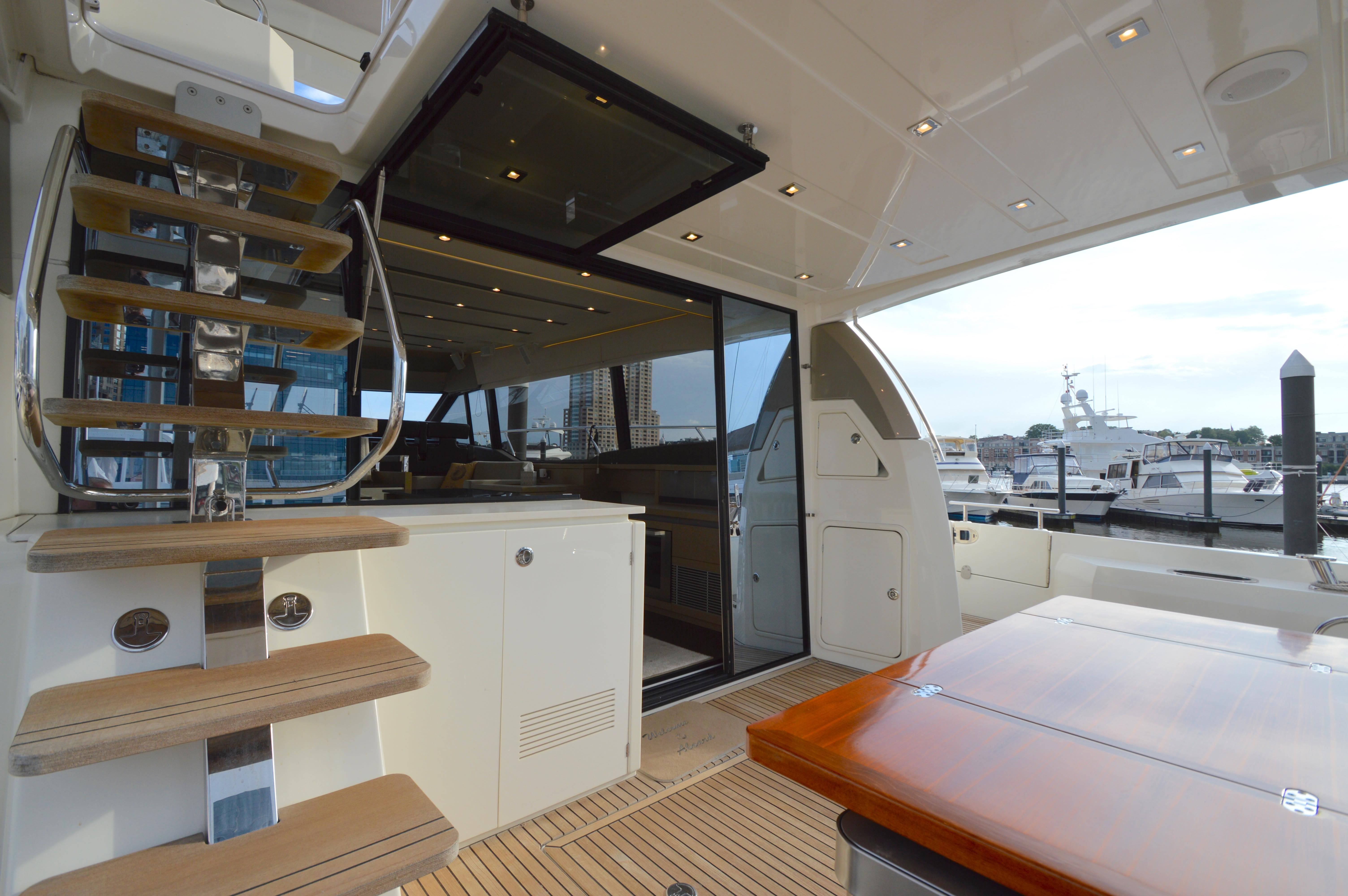 Luxurious interior of a 2017 Prestige 630 yacht at the marina.