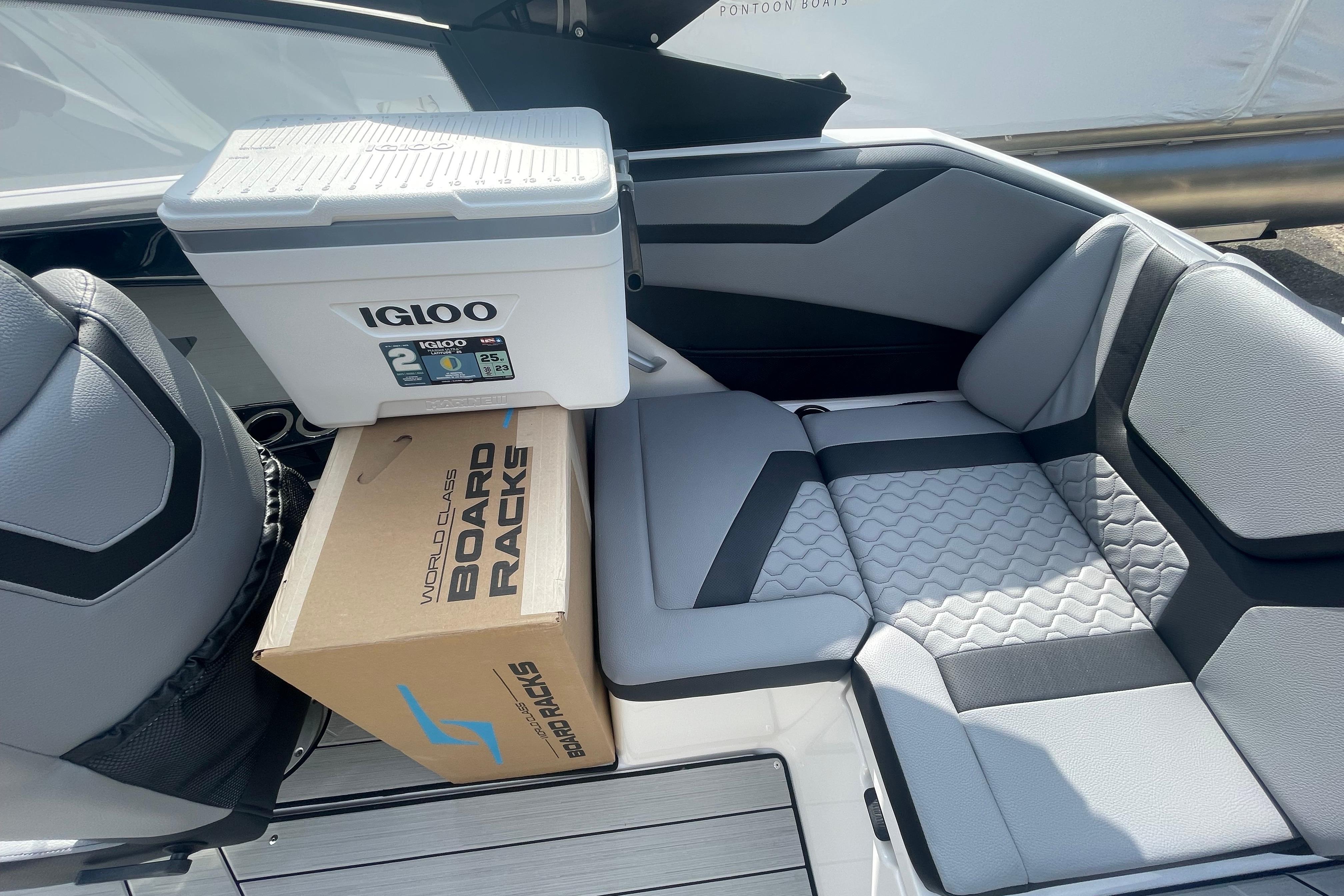 2026 Yamaha Boats 222XD interior with Igloo cooler and board racks box.
