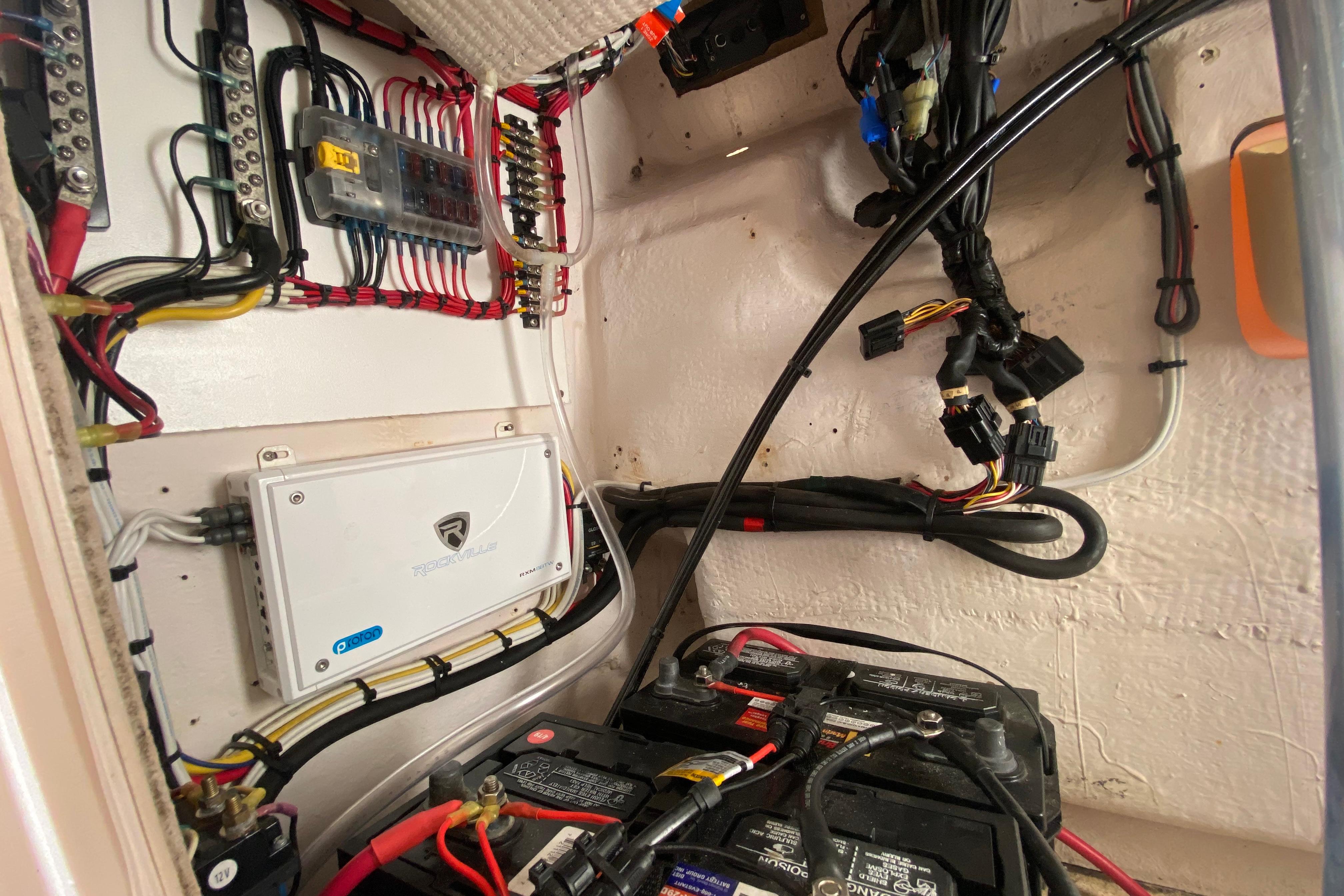 Electrical wiring and components inside a 2004 Grady-White Canyon 283 boat.