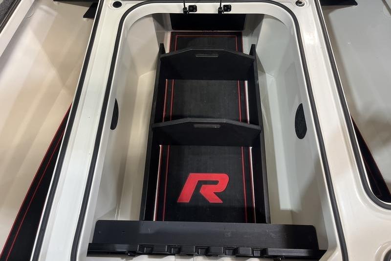 2022 Ranger Z520R boat storage compartment with red logo and dividers.