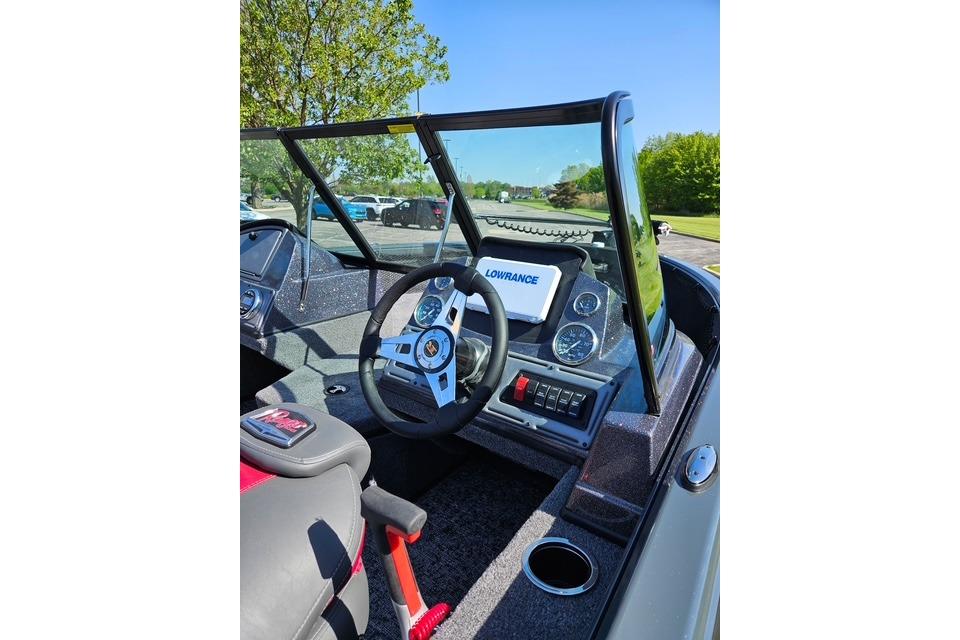 2026 Ranger VS1882SC Angler boat cockpit with steering wheel, Lowrance display, and gauges.