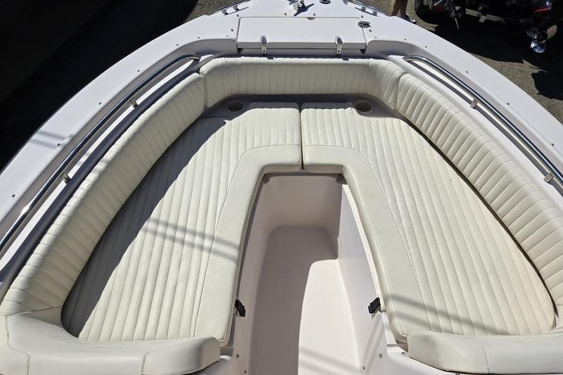 2007 Grady-White Tournament 205 boat interior with white cushioned seating.
