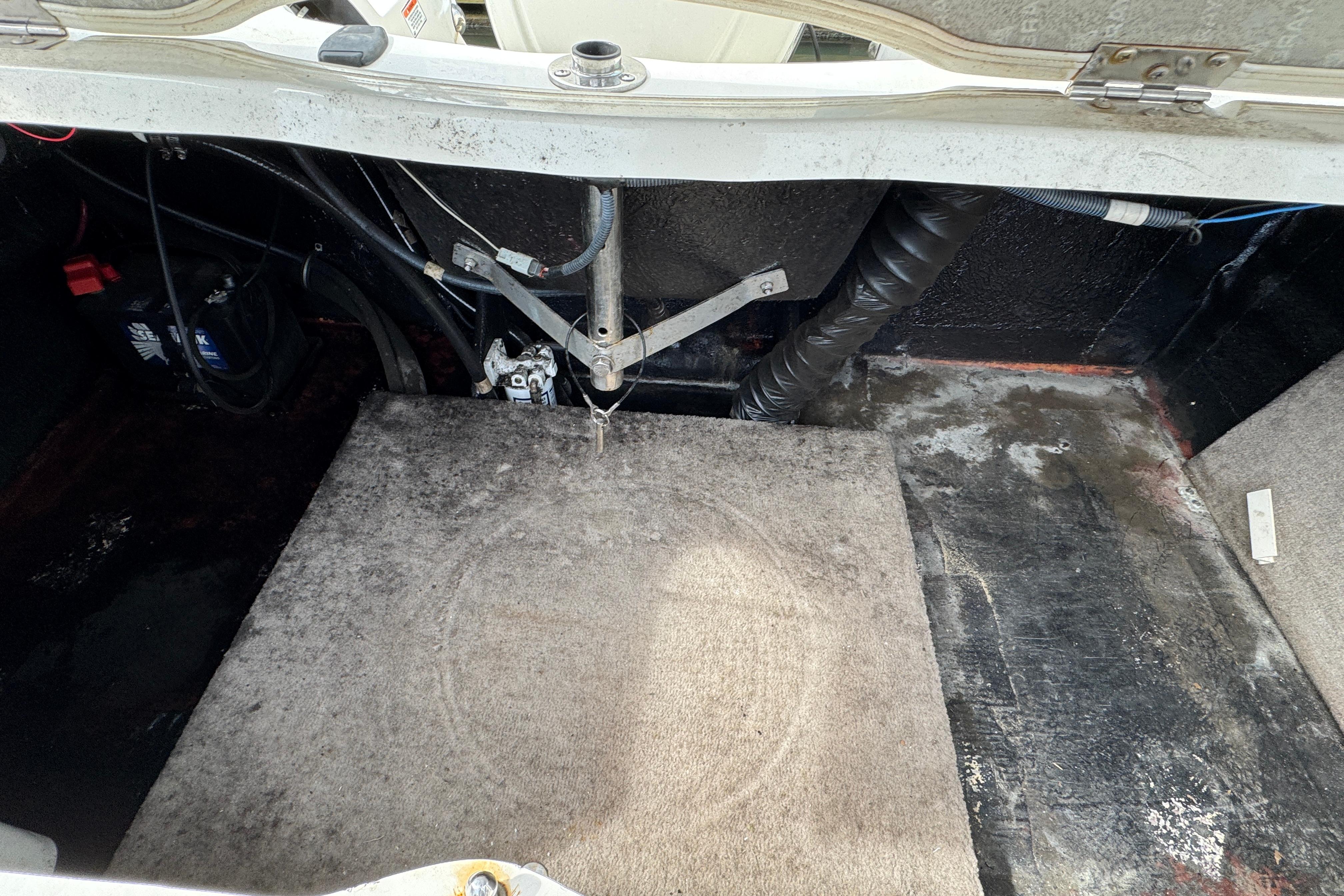 2018 Stingray 204 LR boat interior showing engine compartment and wiring.