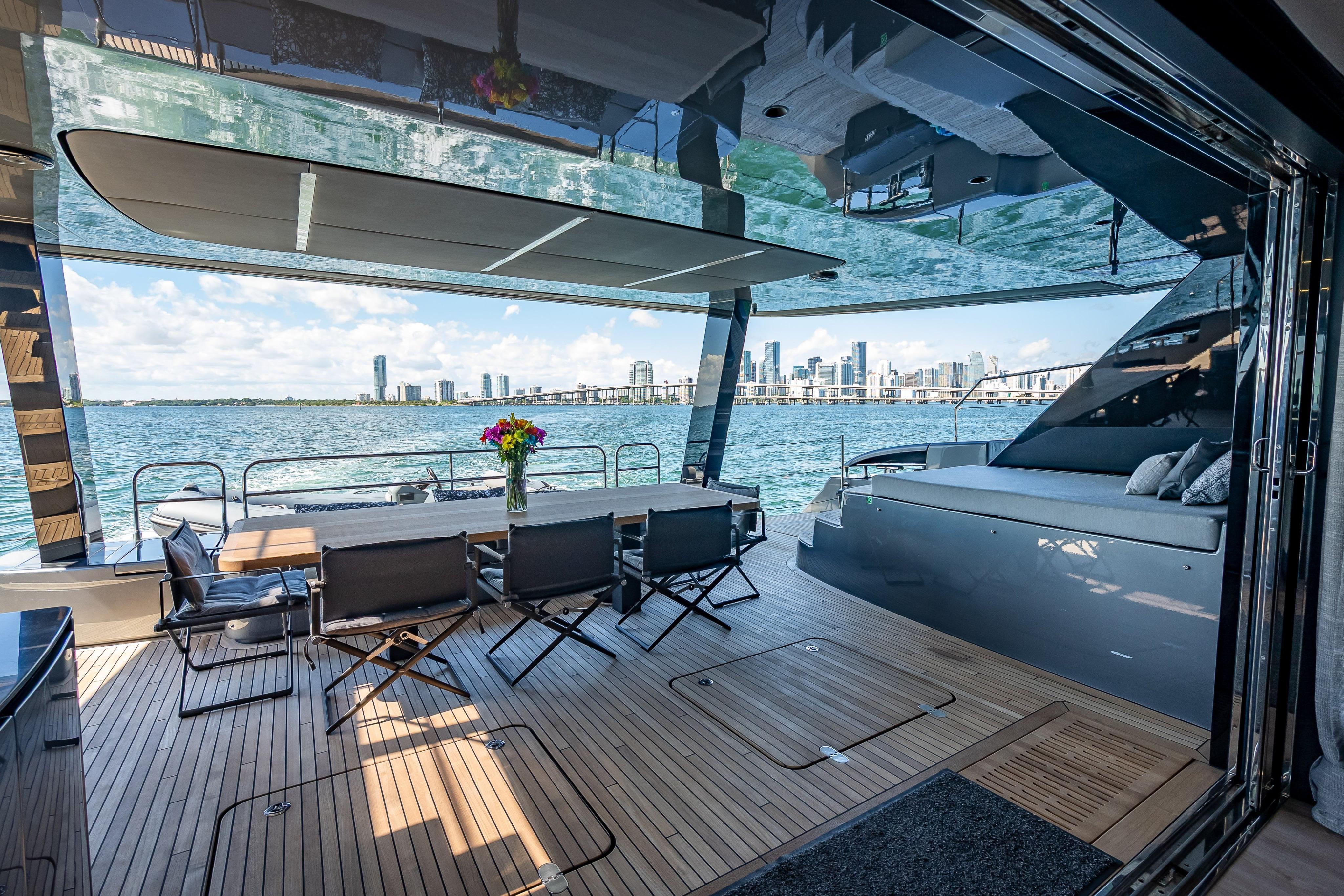 Luxurious Sunreef 60 Power yacht interior with city skyline view, 2026 model.