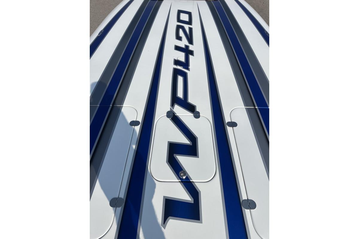 2018 Wright Performance 420 boat deck with blue and white stripes.