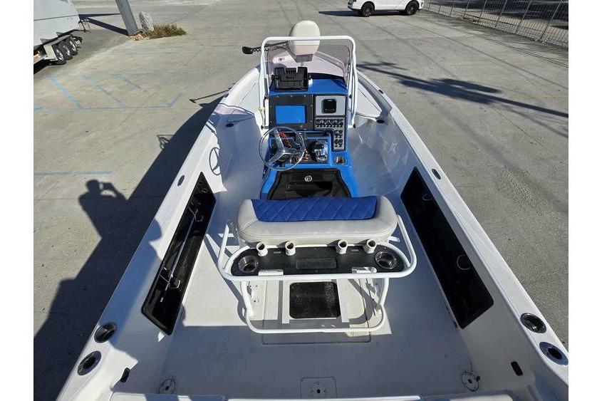 2020 Blue Wave 2400 PureBay boat interior with steering console and seating.