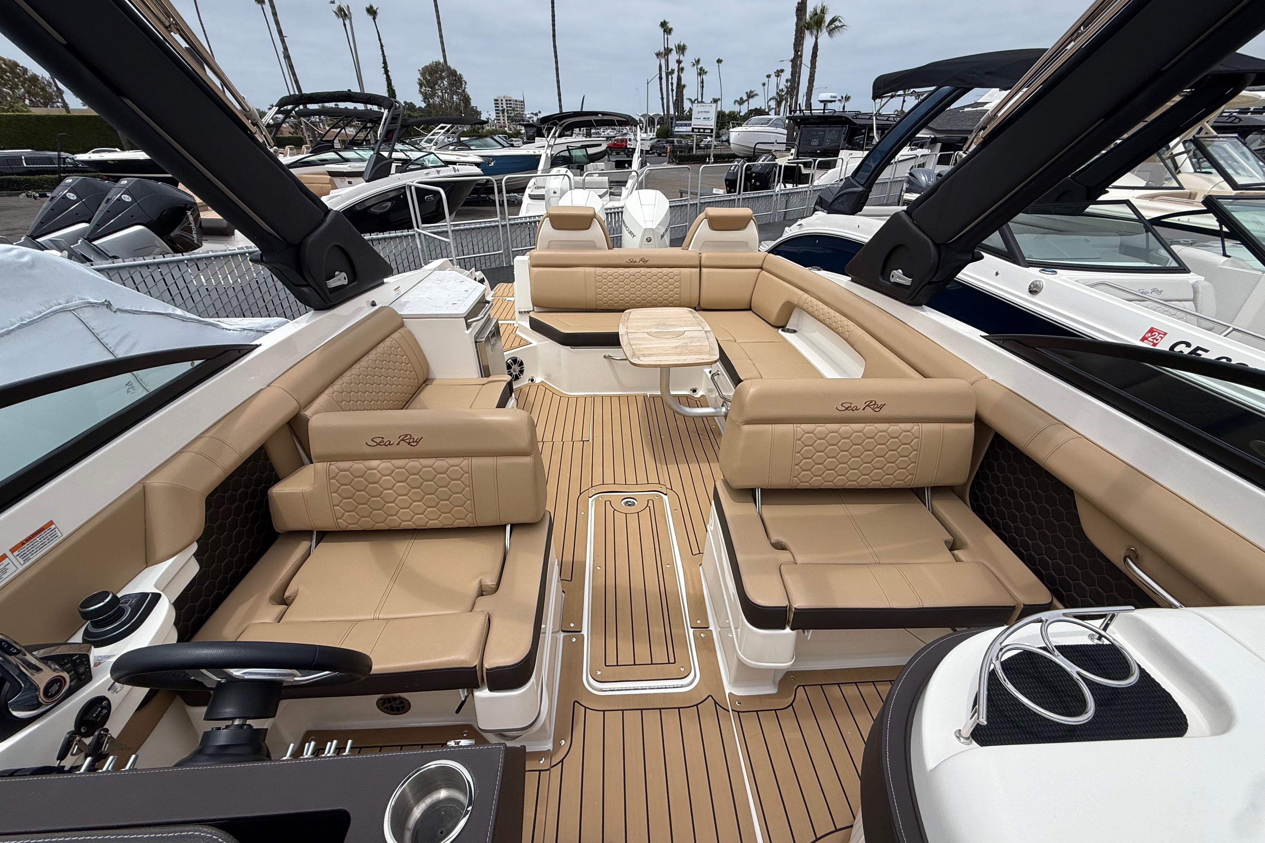 2022 Sea Ray SDX 290 Outboard boat interior with luxurious seating and modern design.