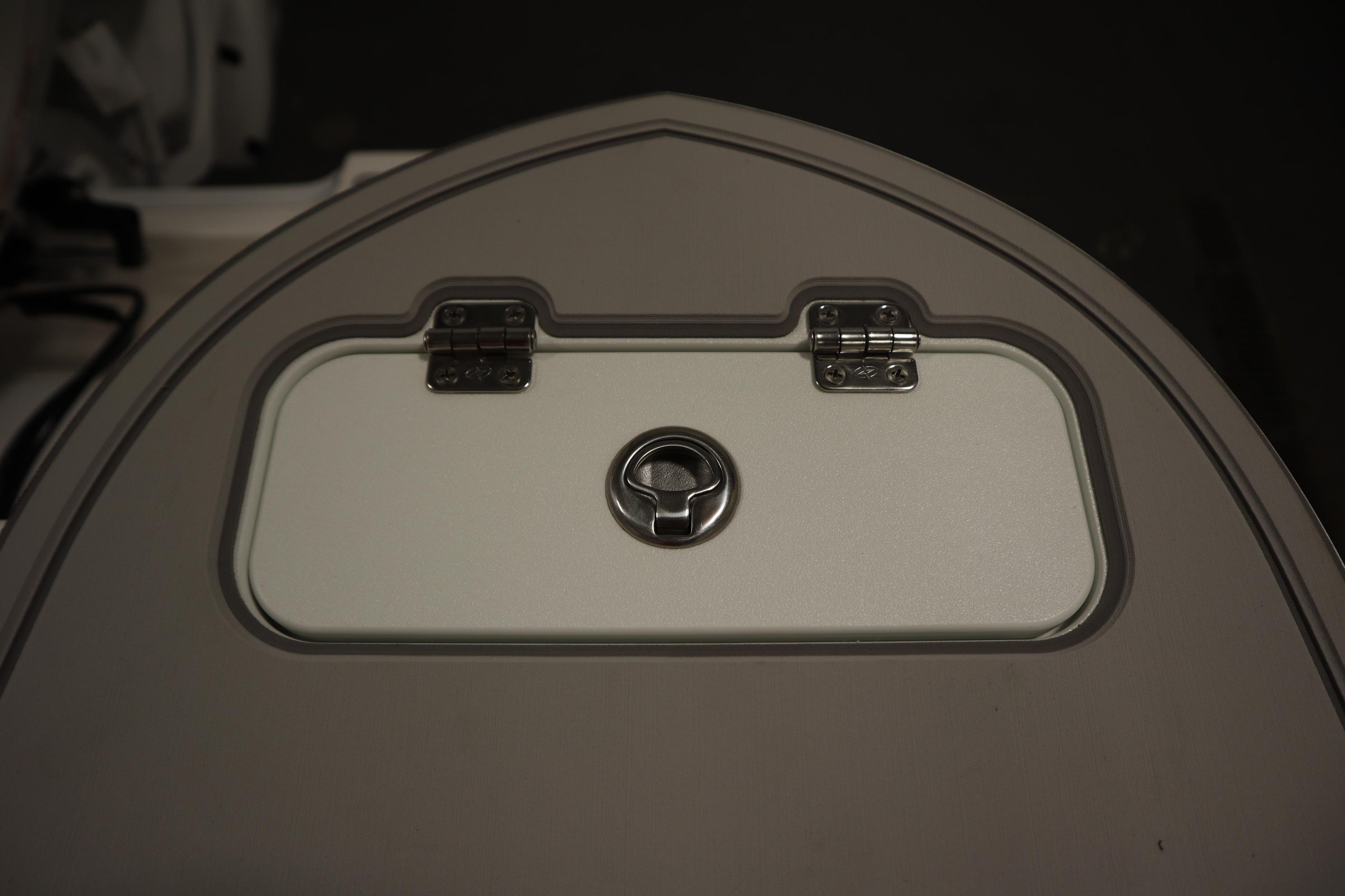 Hatch detail of 2026 Sea Fox 228 Commander boat, featuring a secure latch.