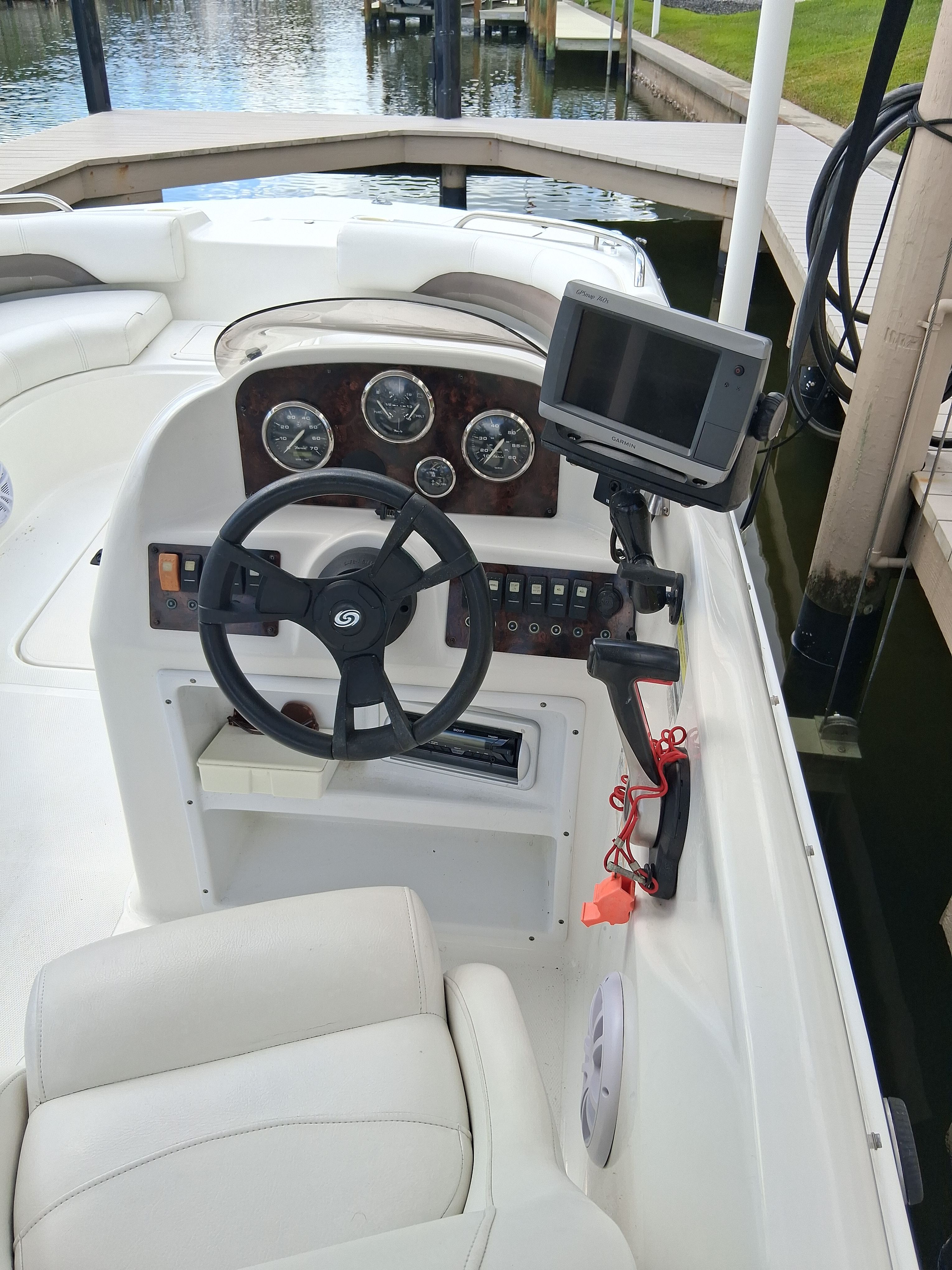 Interior view of a 2013 Hurricane 188SD boat at dock.