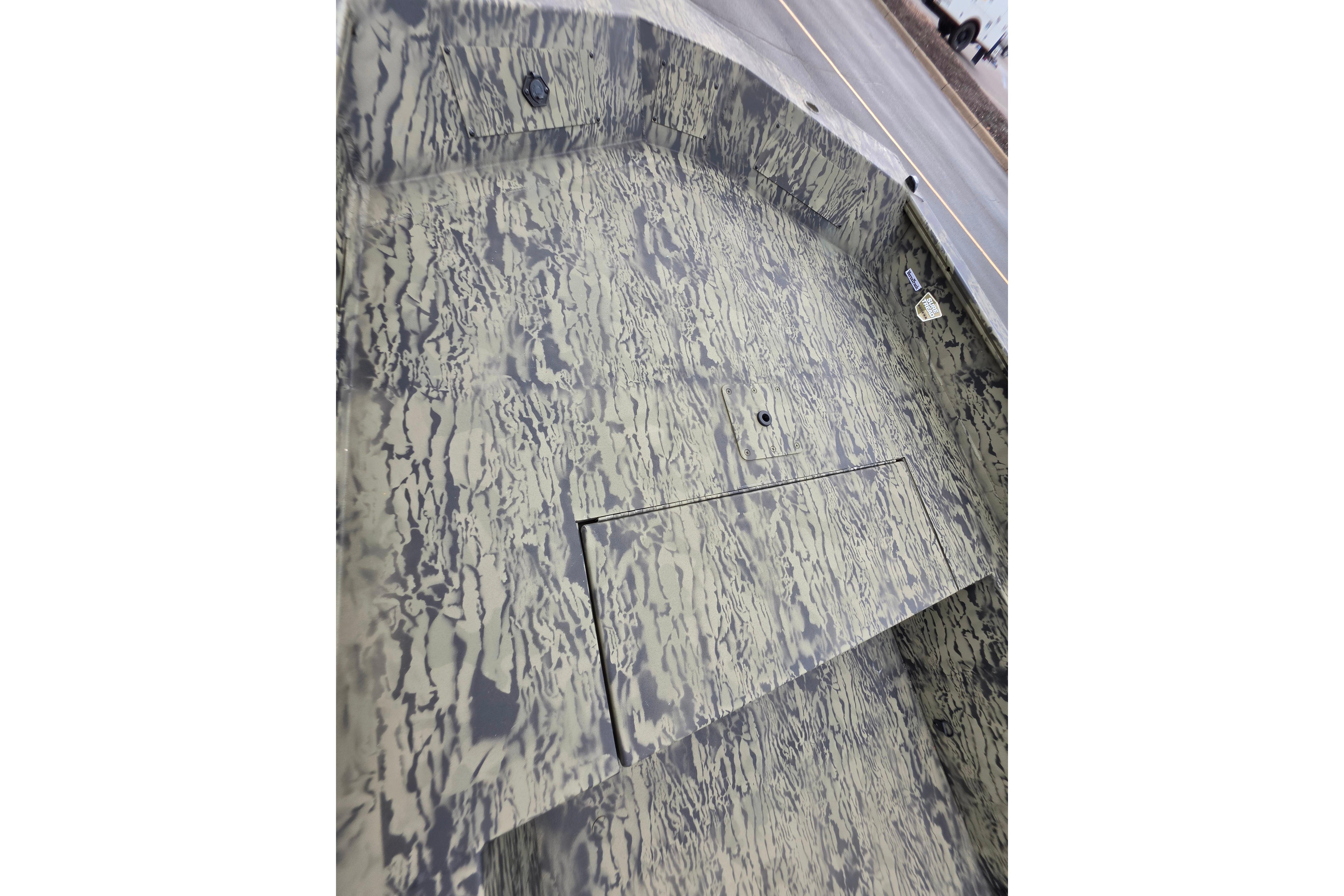 2026 Tracker Grizzly 1650 T Prairie Wings Edition boat interior with camouflage pattern.