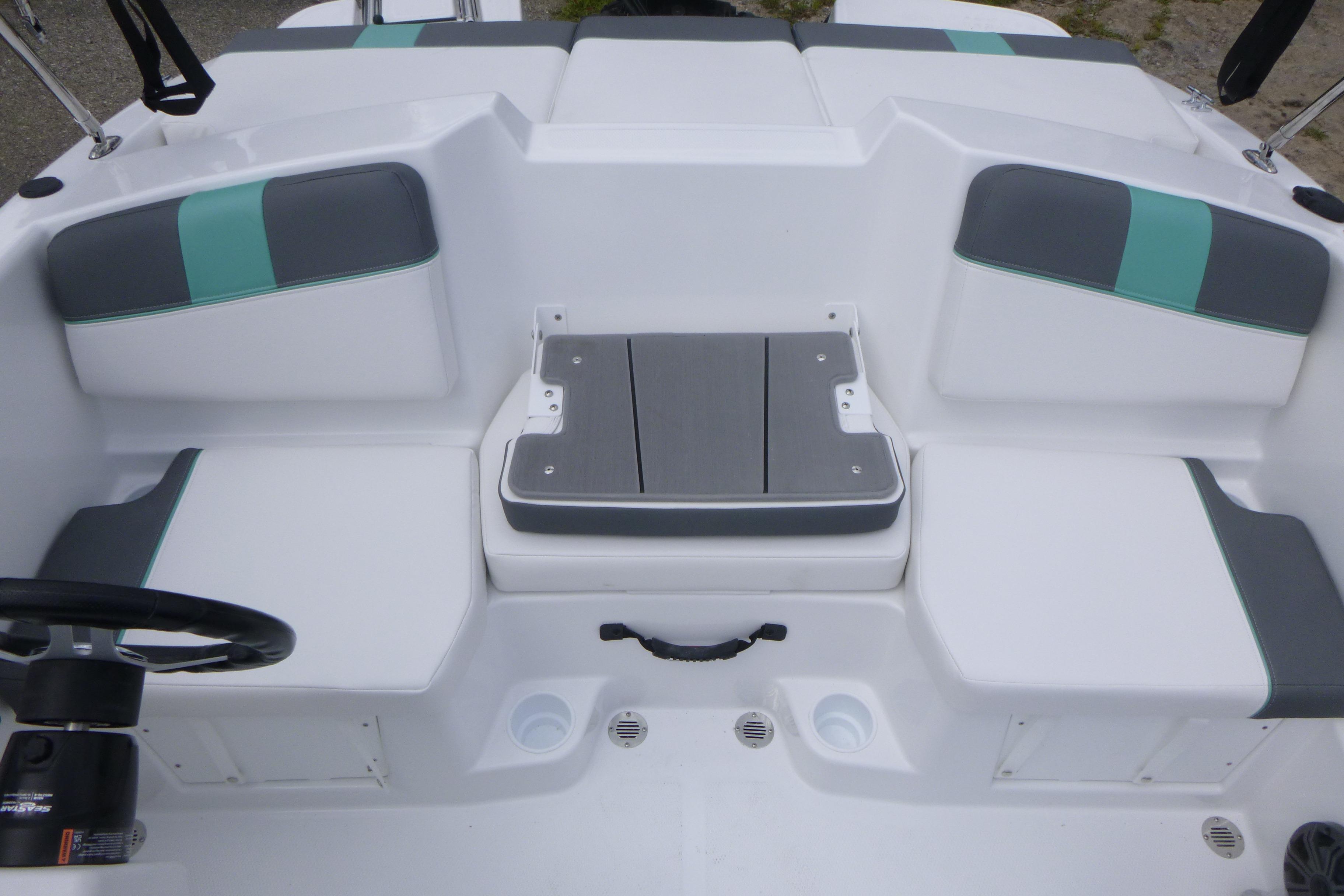 2026 Tahoe T16 boat interior with white and teal seating arrangement.