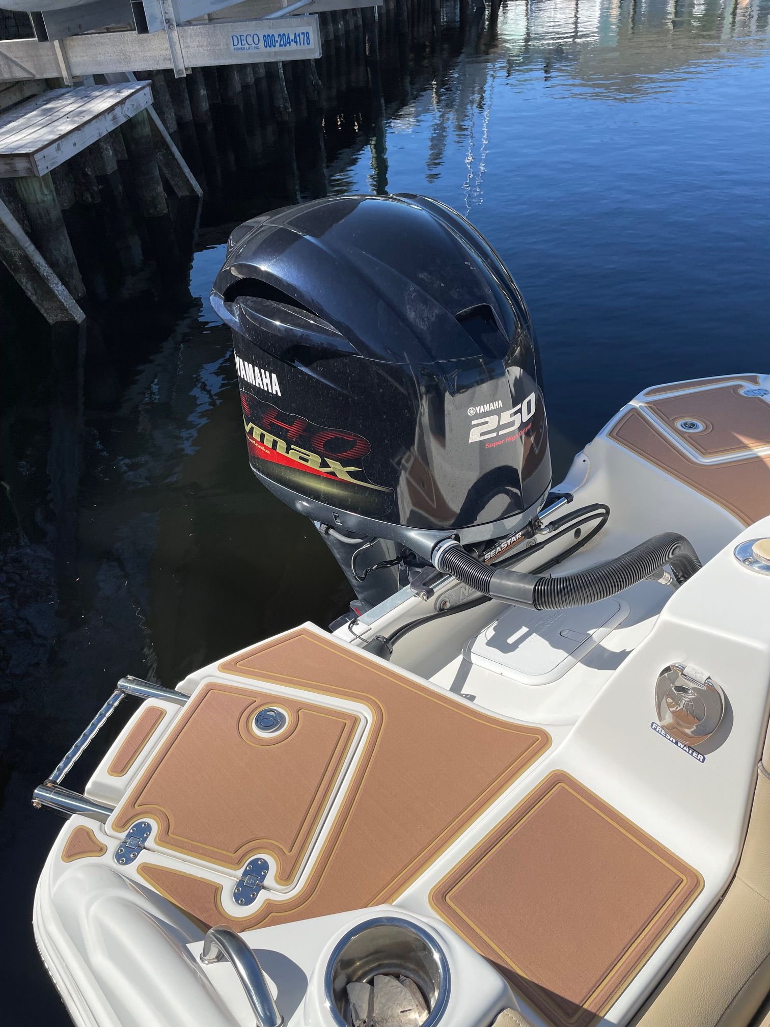 2019 NauticStar 243DC Sport Deck with Yamaha 250 engine at the dock.