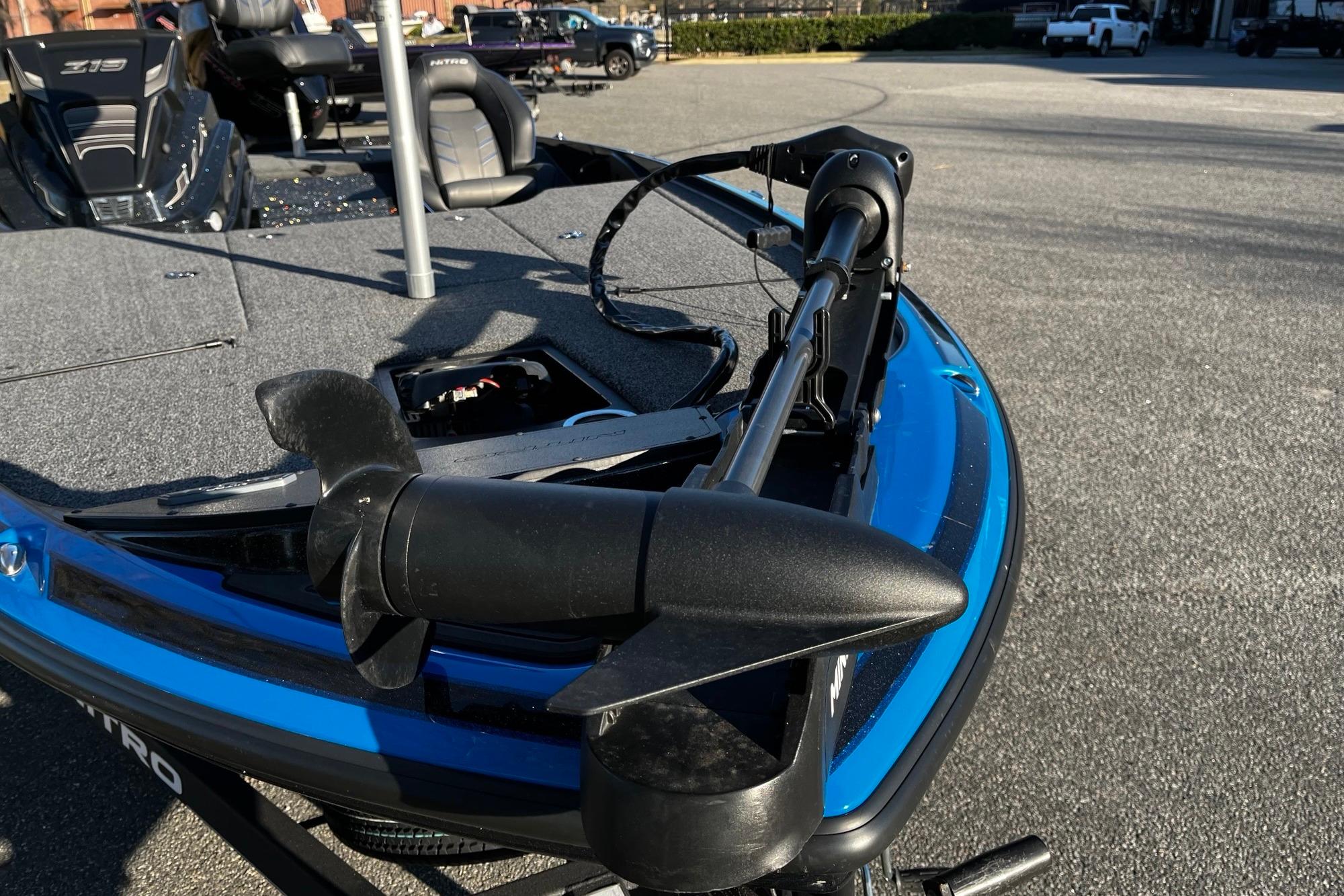 2024 Nitro Z19 boat with trolling motor on a sunny day.