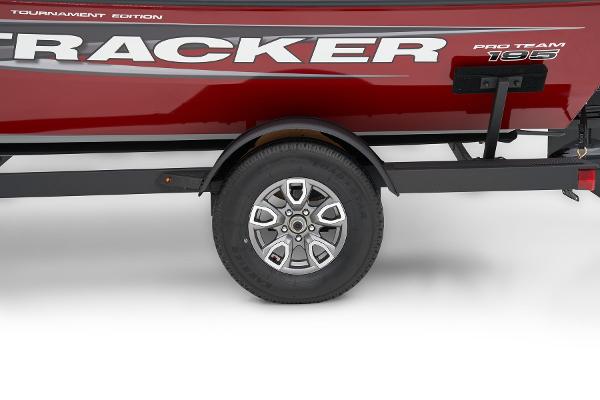Manufacturer Provided Image: 2025 Tracker Pro Team 195 Tournament Edition boat trailer with red exterior and alloy wheel.
