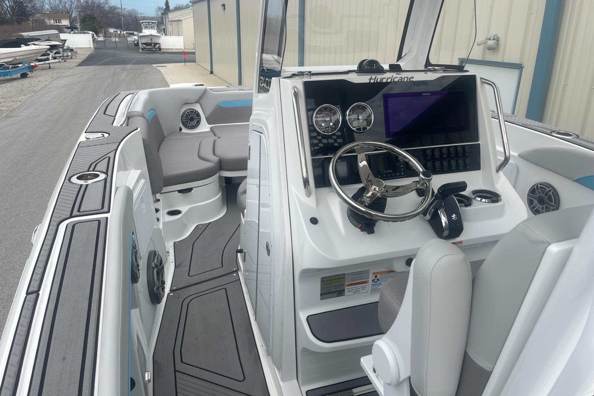 2025 Hurricane Center Console 24 OB boat interior with modern dashboard and seating.