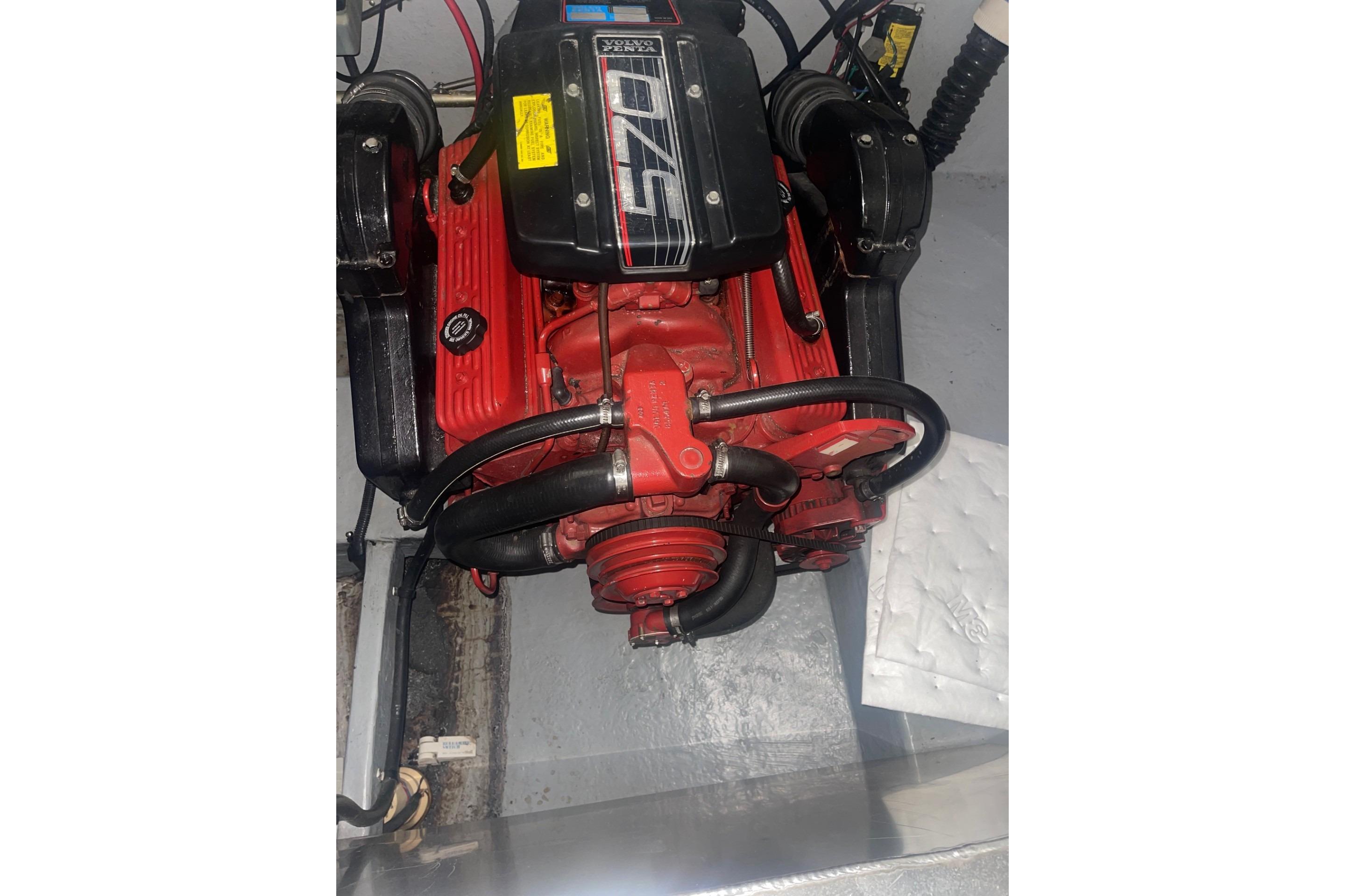 Engine of 1992 Chaparral Signature 30 boat, featuring red and black components.