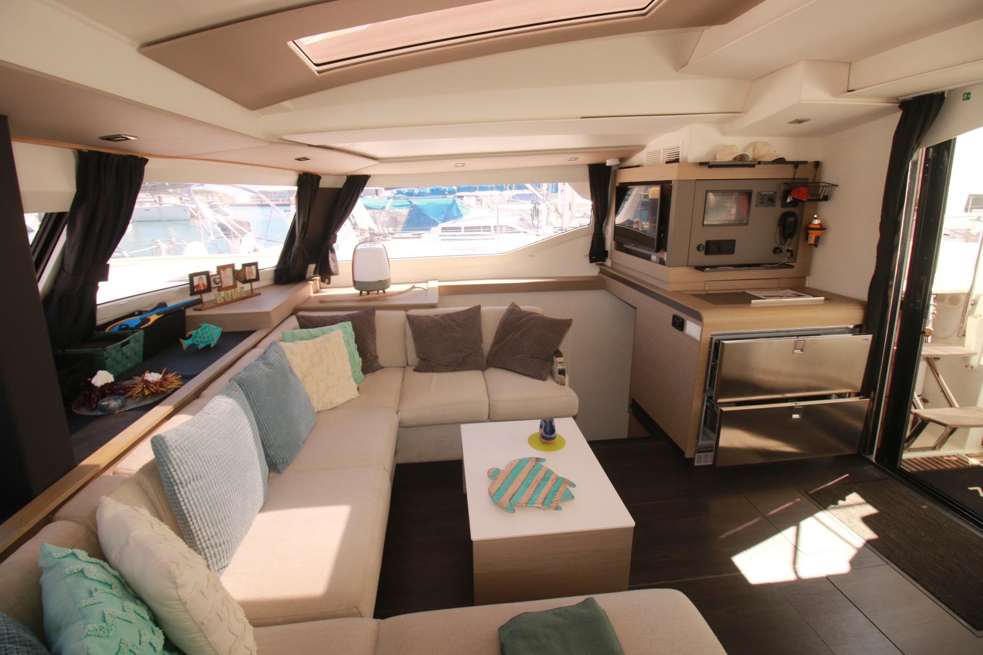 Luxurious interior of 2022 Fountaine Pajot Elba 45 Catamaran with modern furnishings.