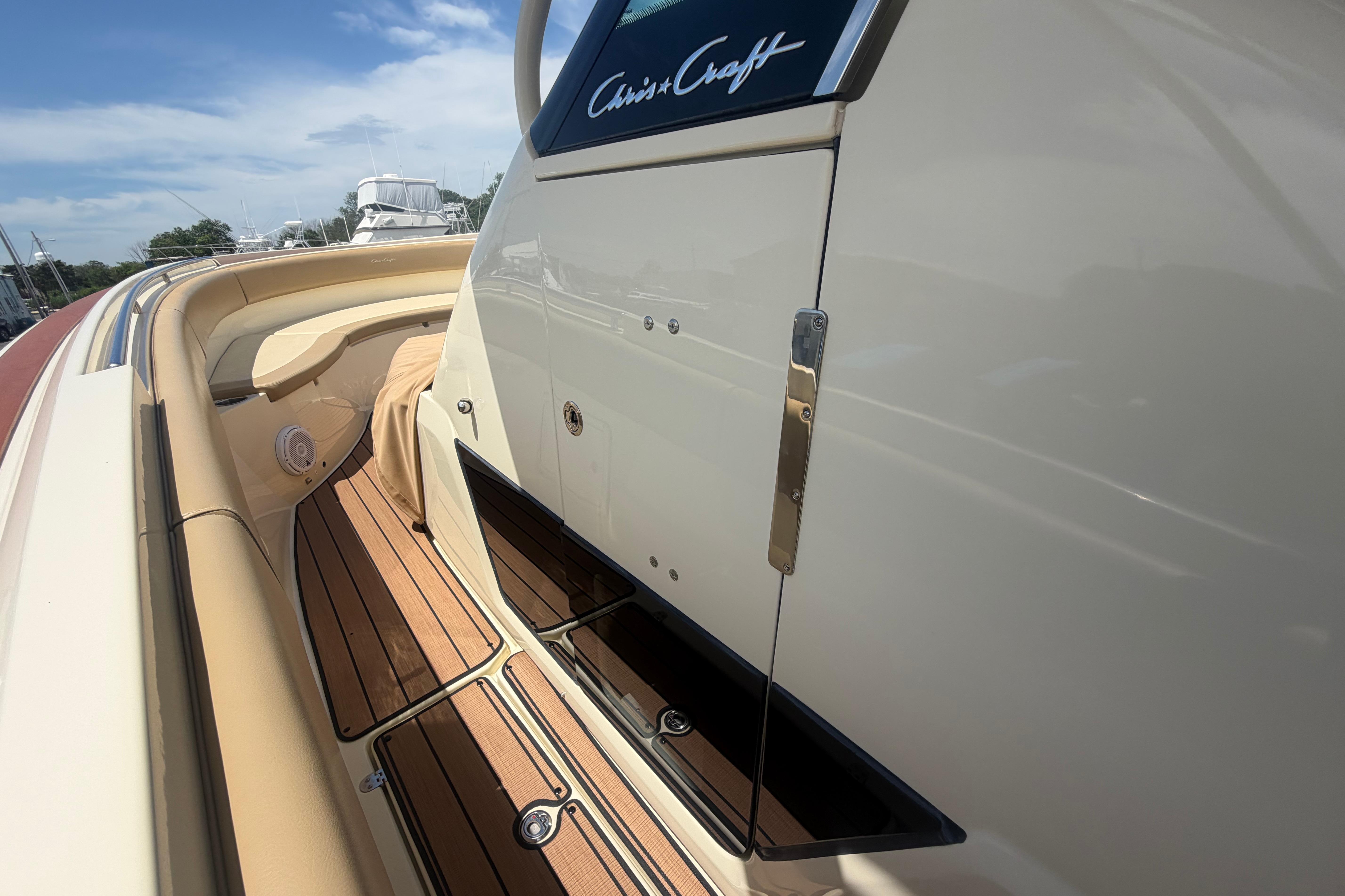 2017 Chris-Craft Catalina 34 boat deck with elegant wood finish and sleek design.