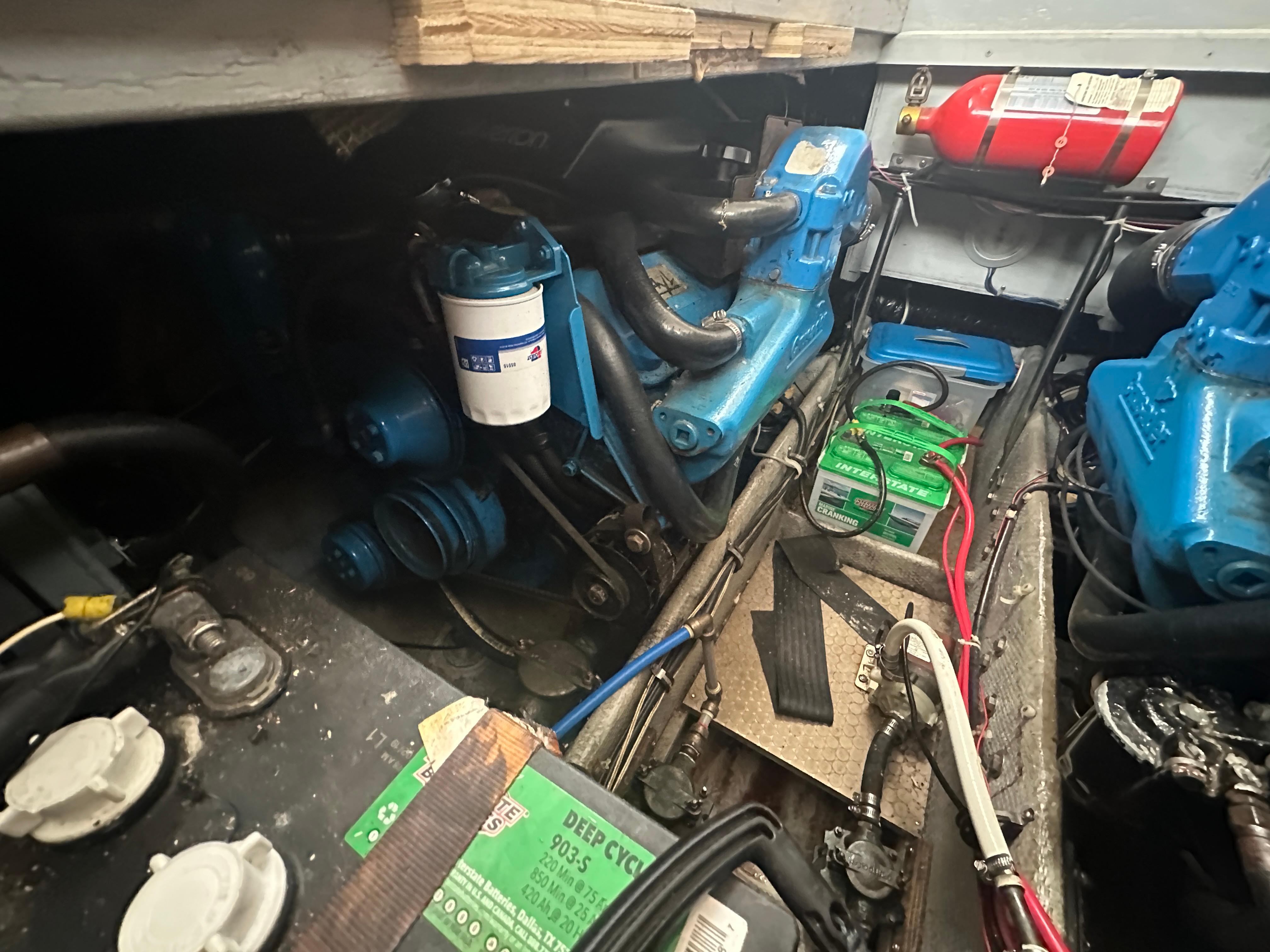 Engine room of a 1994 Silverton 34 Aft Cabin Motor Yacht with visible components.