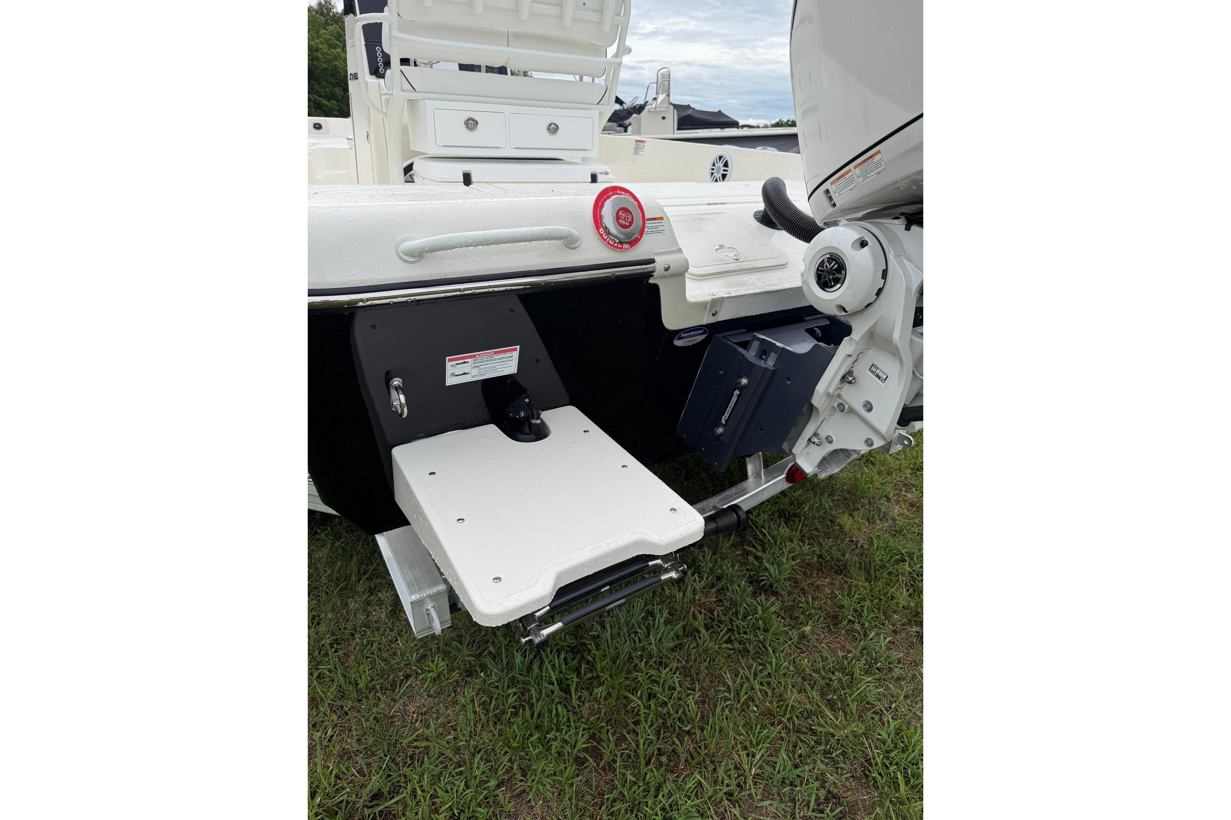 2026 Skeeter SX2350 boat rear view with motor and step platform.