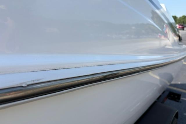 2024 Tahoe T21 boat close-up, showcasing sleek white hull design.
