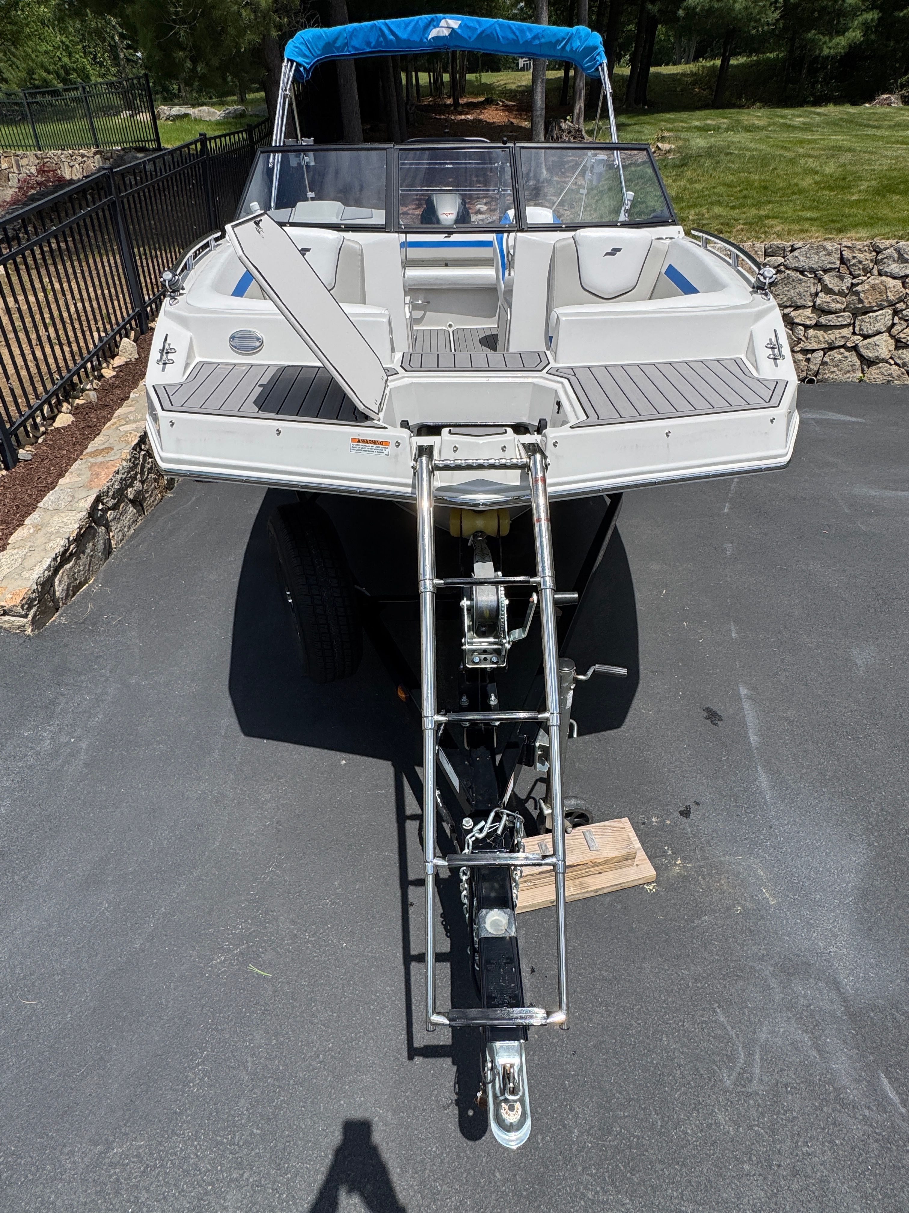 2023 Starcraft SVX 190 OB boat on trailer, front view.
