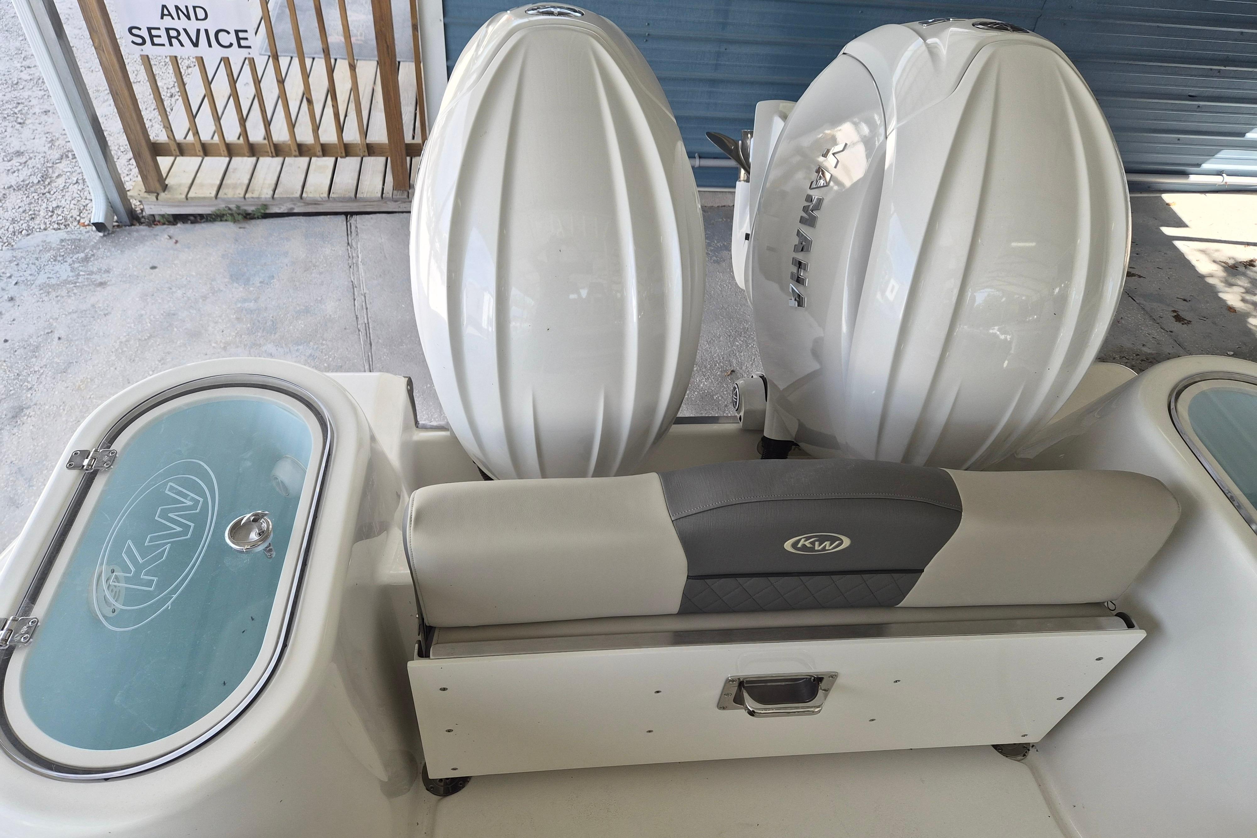 2026 Key West 260 Center Console boat with dual engines and KW logo.