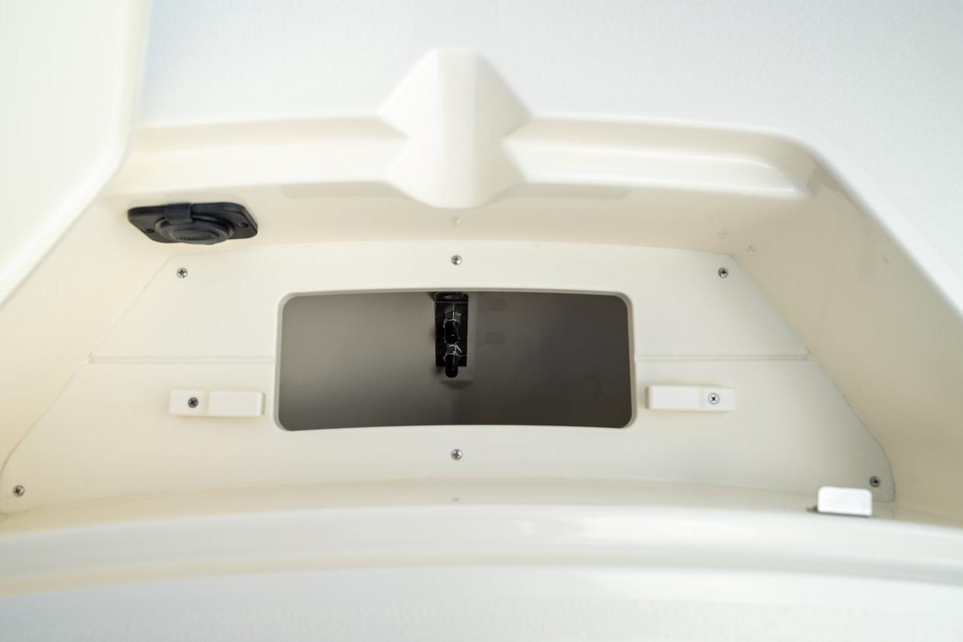 2026 Scout 188 Sportfish boat storage compartment, featuring a sleek, white interior design.